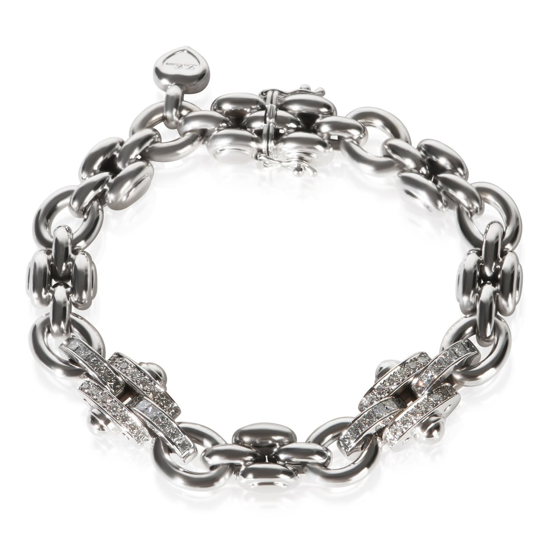 18k White Gold Diamond Bracelet by Chopard 7.5 in: 18k White Gold Diamond Bracelet by Chopard 7.5 in Elegant Chopard bracelet crafted in 18k white gold and accented with round brilliant diamonds. This women's bracelet features a box clasp with tongue 