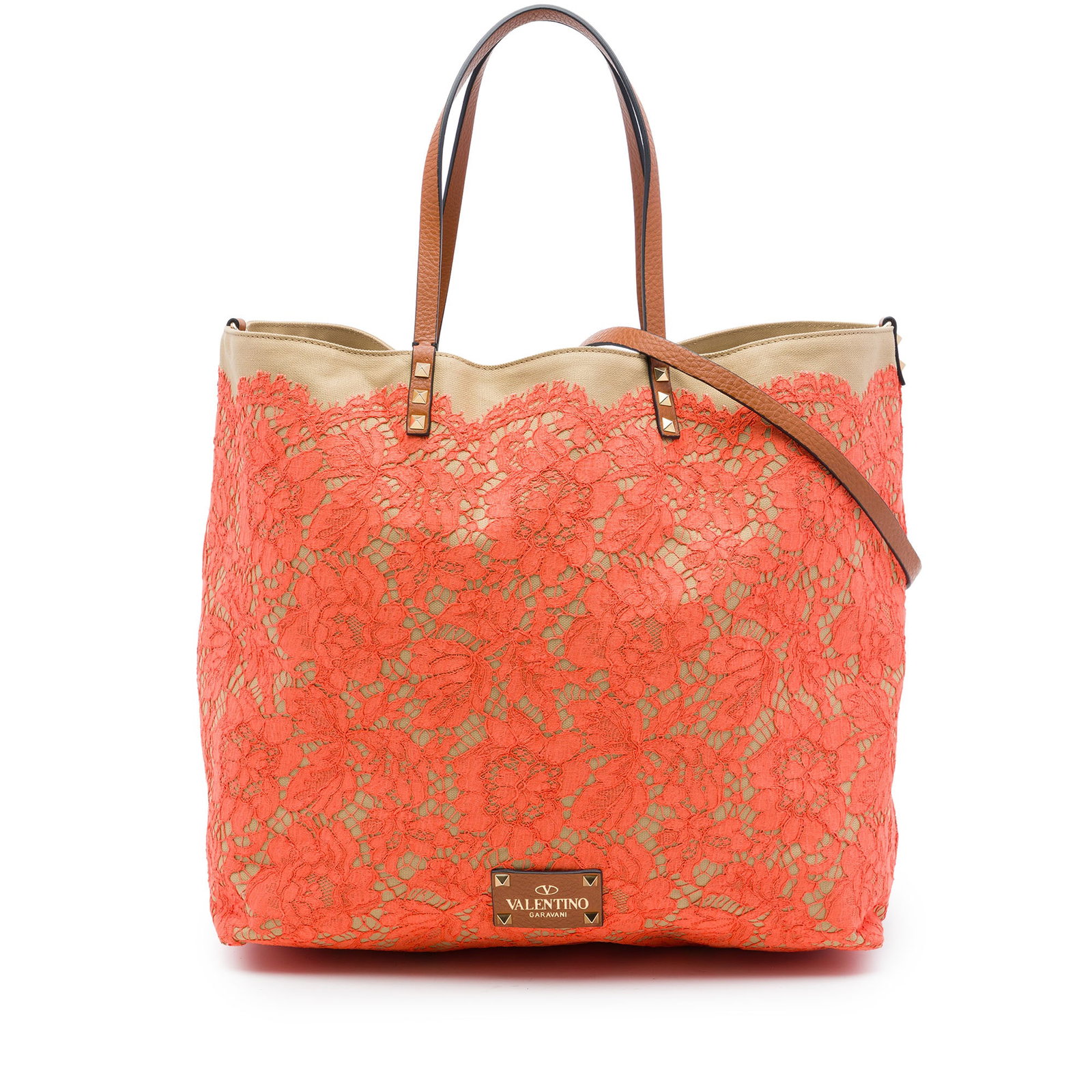 Valentino Rockstud Glam Lace Reversible Canvas Tote Bag: Valentino Rockstud Glam Lace Reversible Canvas Tote Bag A Valentino reversible tote with a lace-embellished canvas body, flat studded leather handles, a detachable flat leather strap, and an open top.