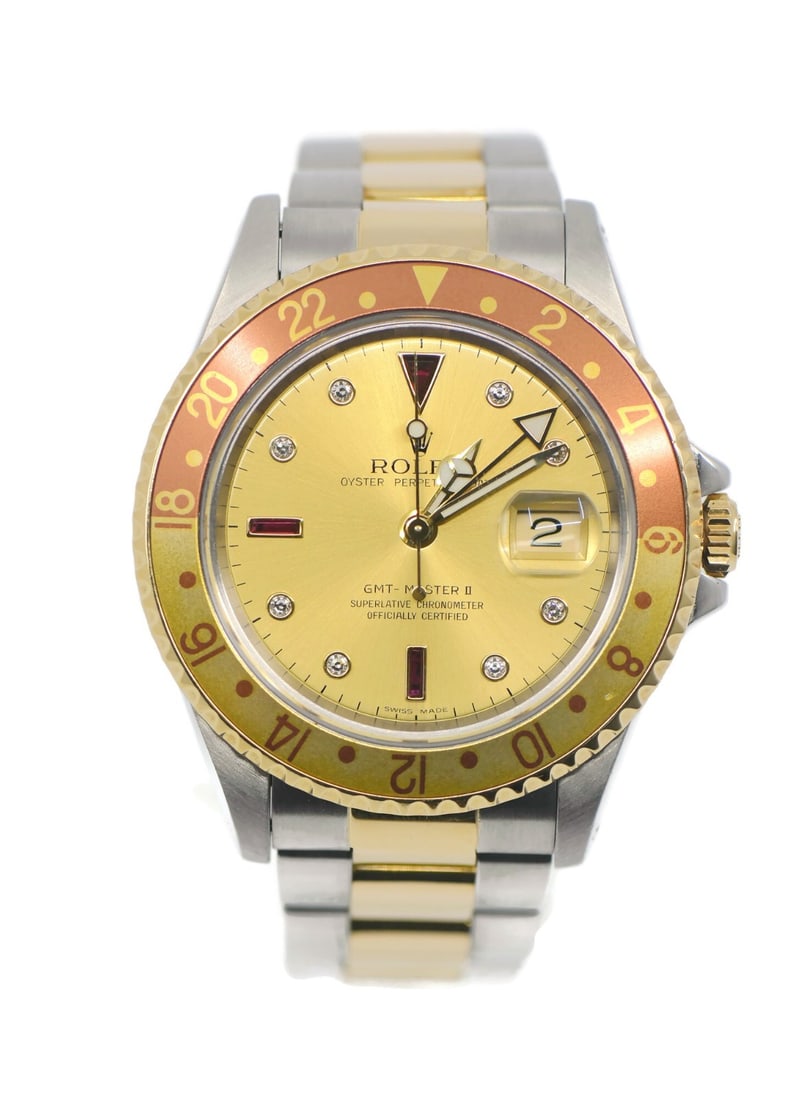 Rolex 16713 GMT-Master II Serti Diamond Steel 18K Wristwatch: Rolex 16713 GMT-Master II Serti Diamond Steel 18K Wristwatch Pre-owned Rolex GMT-Master II Serti Diamond wristwatch with a round 40 mm case and automatic mechanical movement. This men's luxury watch f