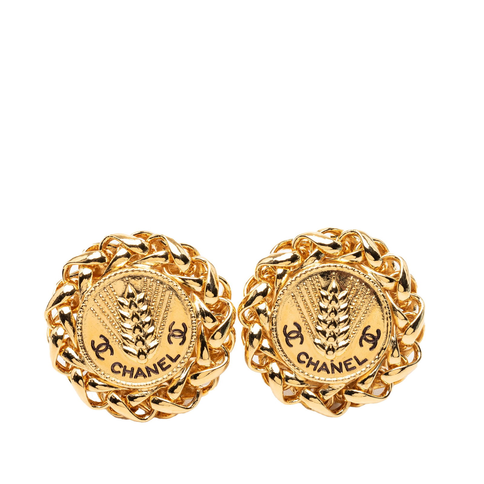 Chanel Gold Tone Wheat Medallion Clip On Earrings: Chanel Gold Tone Wheat Medallion Clip On Earrings These Chanel CC Gold Plated Wheat Medallion earrings feature a gold-tone metal body with a distinctive wheat medallion design and clip-on closures. Cr
