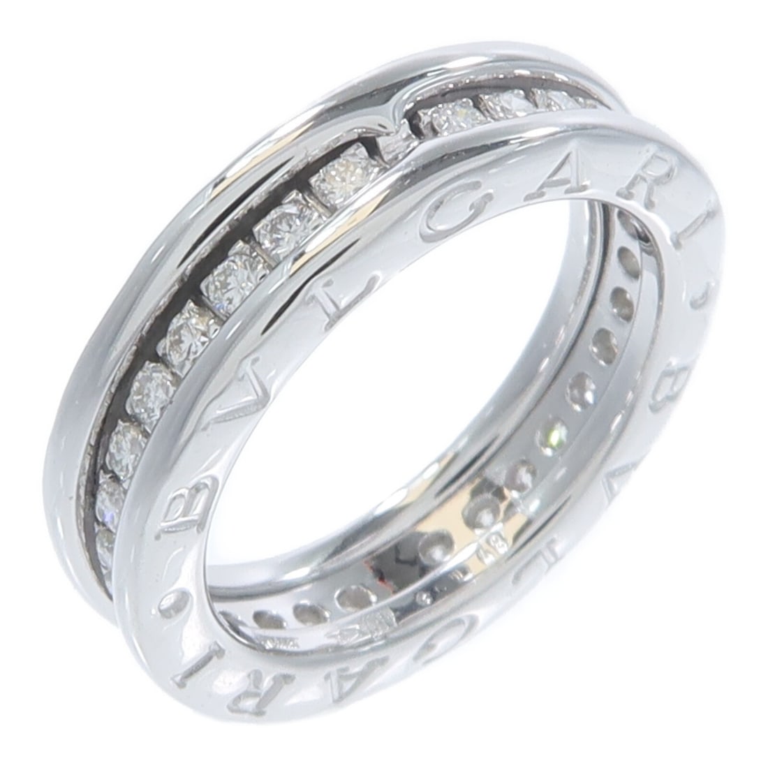 BVLGARI B-zero1 329351 diamond ring in 18K white gold size 4.5: BVLGARI B-zero1 329351 diamond ring in 18K white gold size 4.5 BVLGARI B-zero1 diamond ring in 18K white gold with a clear diamond design. This women's ring is model 329351 and is made in Italy. It is
