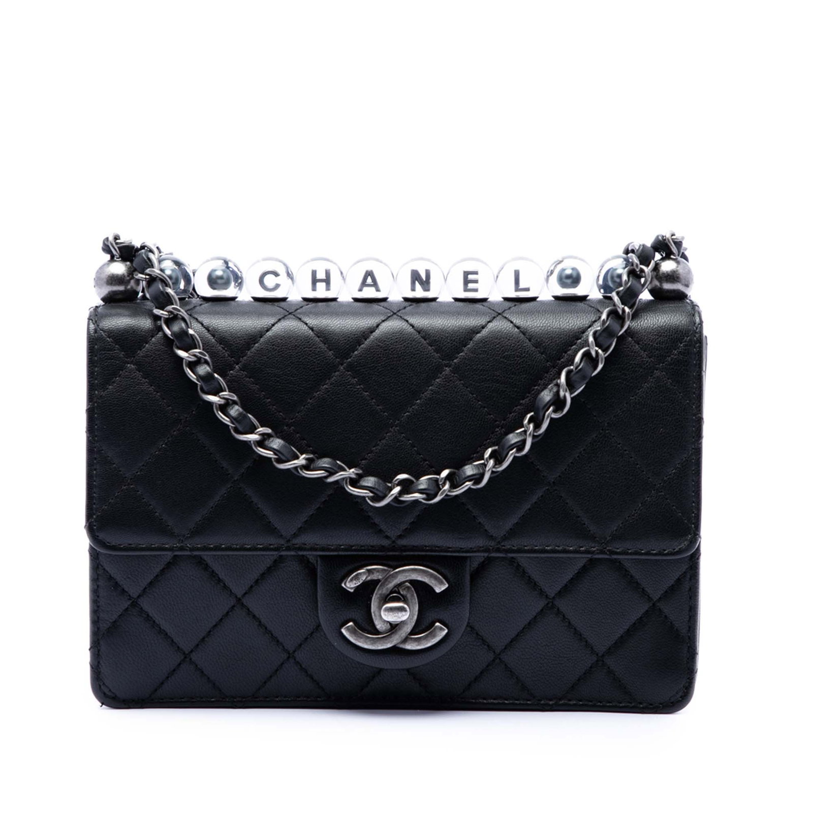 Chanel Chic Pearls Medium Flap Crossbody in Quilted Goatskin: Chanel Chic Pearls Medium Flap Crossbody in Quilted Goatskin Medium Chanel Chic Pearls Flap crossbody bag crafted with a quilted goatskin leather body and faux pearl detailing. It features a leather-w