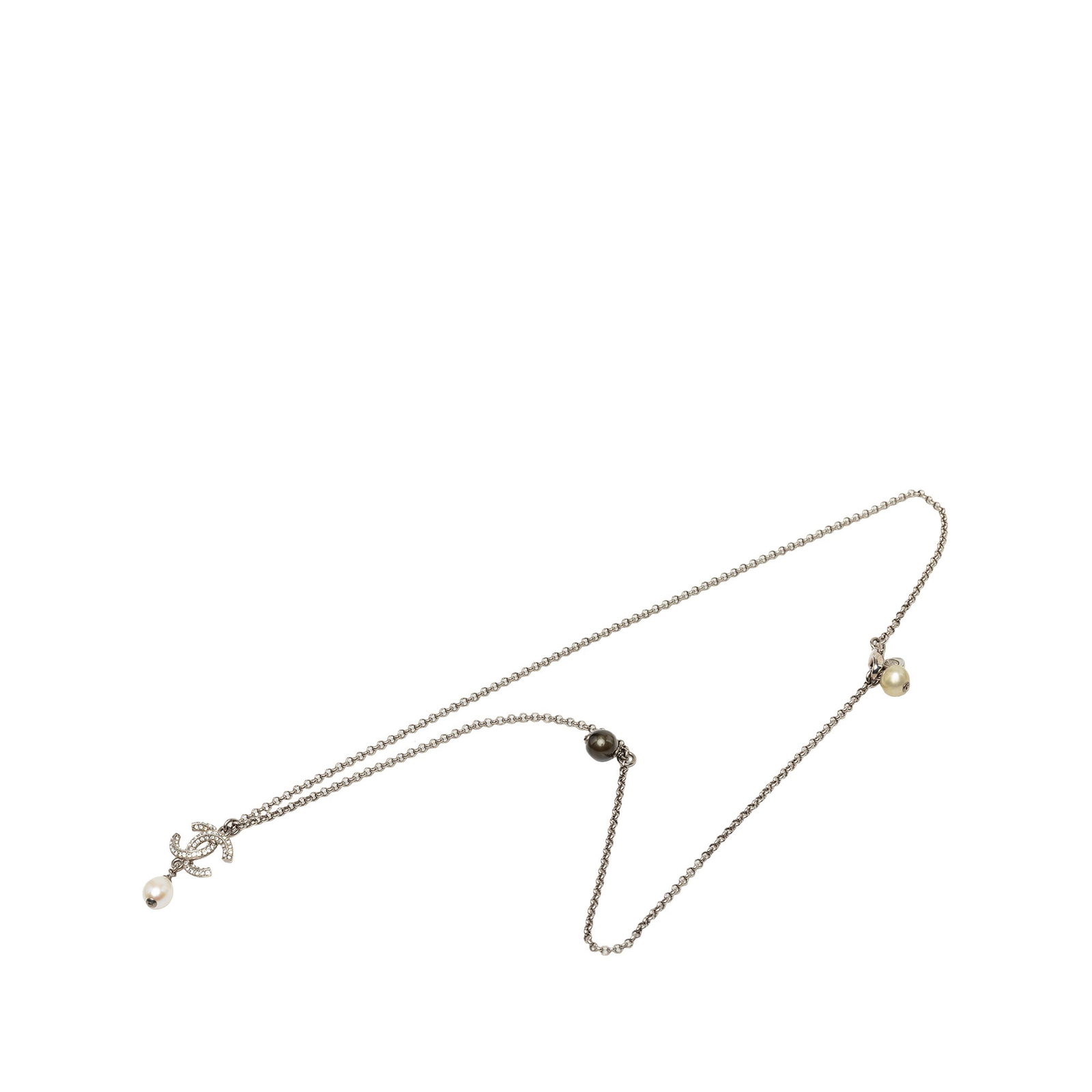 Chanel CC pendant necklace silver tone metal faux pearl strass: Chanel CC pendant necklace silver tone metal faux pearl strass Chanel pendant necklace featuring a silver-tone metal chain with a strass-embellished CC pendant and faux pearl charm. Finished with a lo