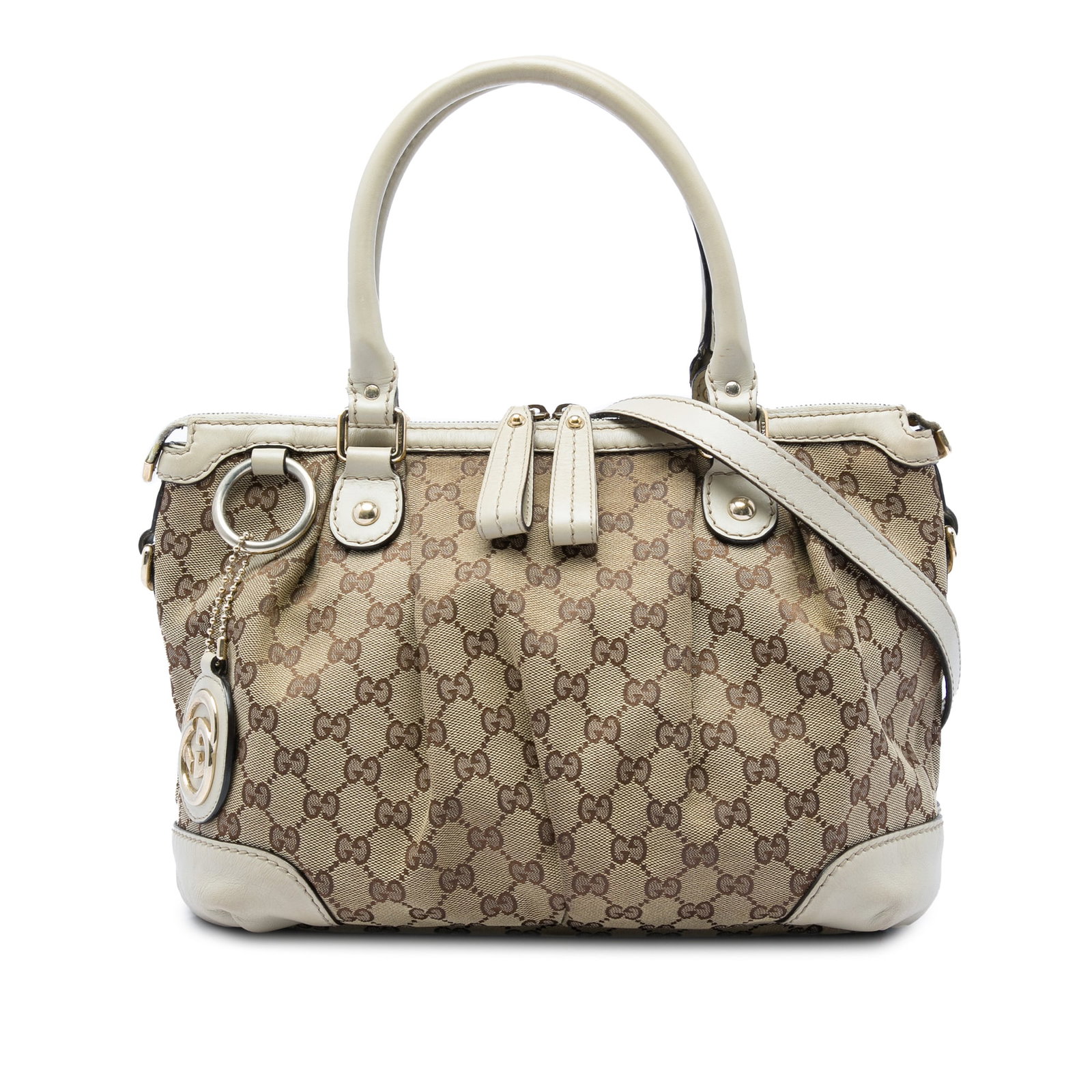 Gucci Sukey Satchel Beige GG Canvas and Leather Bag: Gucci Sukey Satchel Beige GG Canvas and Leather Bag Gucci GG Canvas Sukey Satchel crafted in beige canvas with leather trim. This satchel features rolled leather handles, an adjustable and detachable 