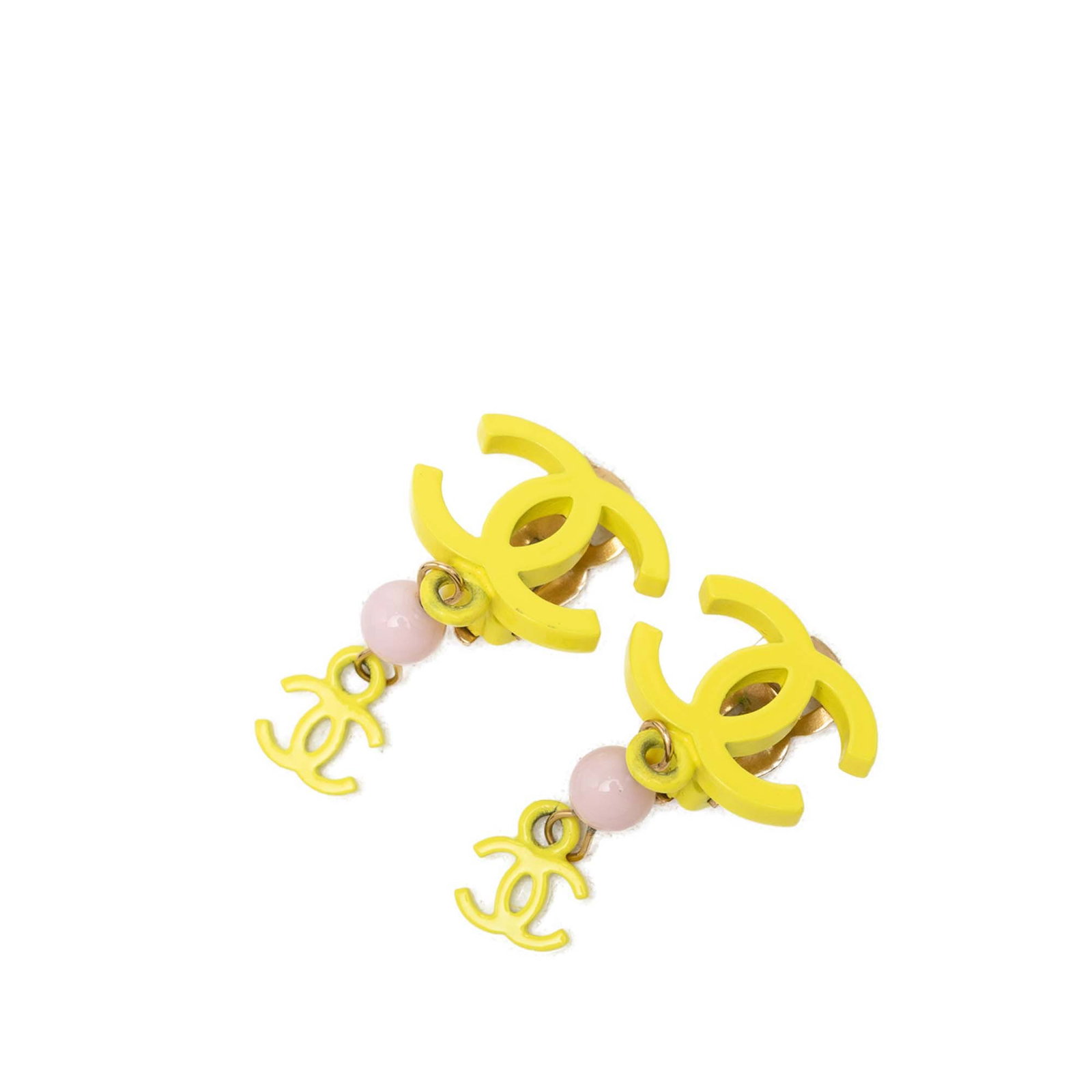 Chanel CC Clip-On Drop Earrings in Yellow Resin Bead: Chanel CC Clip-On Drop Earrings in Yellow Resin Bead Chanel CC resin bead drop clip-on earrings in yellow plastic with resin body construction and bead detailing. These costume earrings are made in Fr