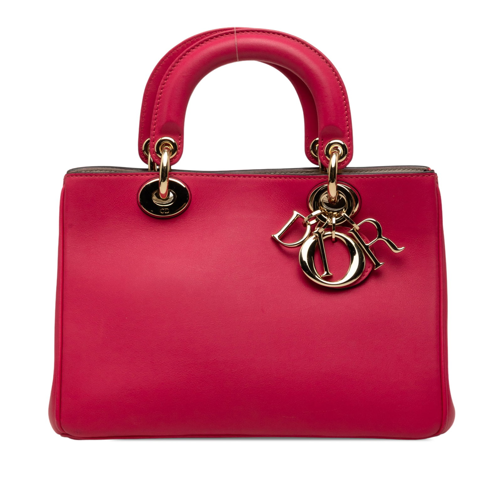 Dior Diorissimo Mini Leather Satchel Pink Italy: Dior Diorissimo Mini Leather Satchel Pink Italy A compact Dior Diorissimo satchel crafted in pink leather with flat top handles, an open top, magnetic snap closure, and an interior slip pocket. Includ