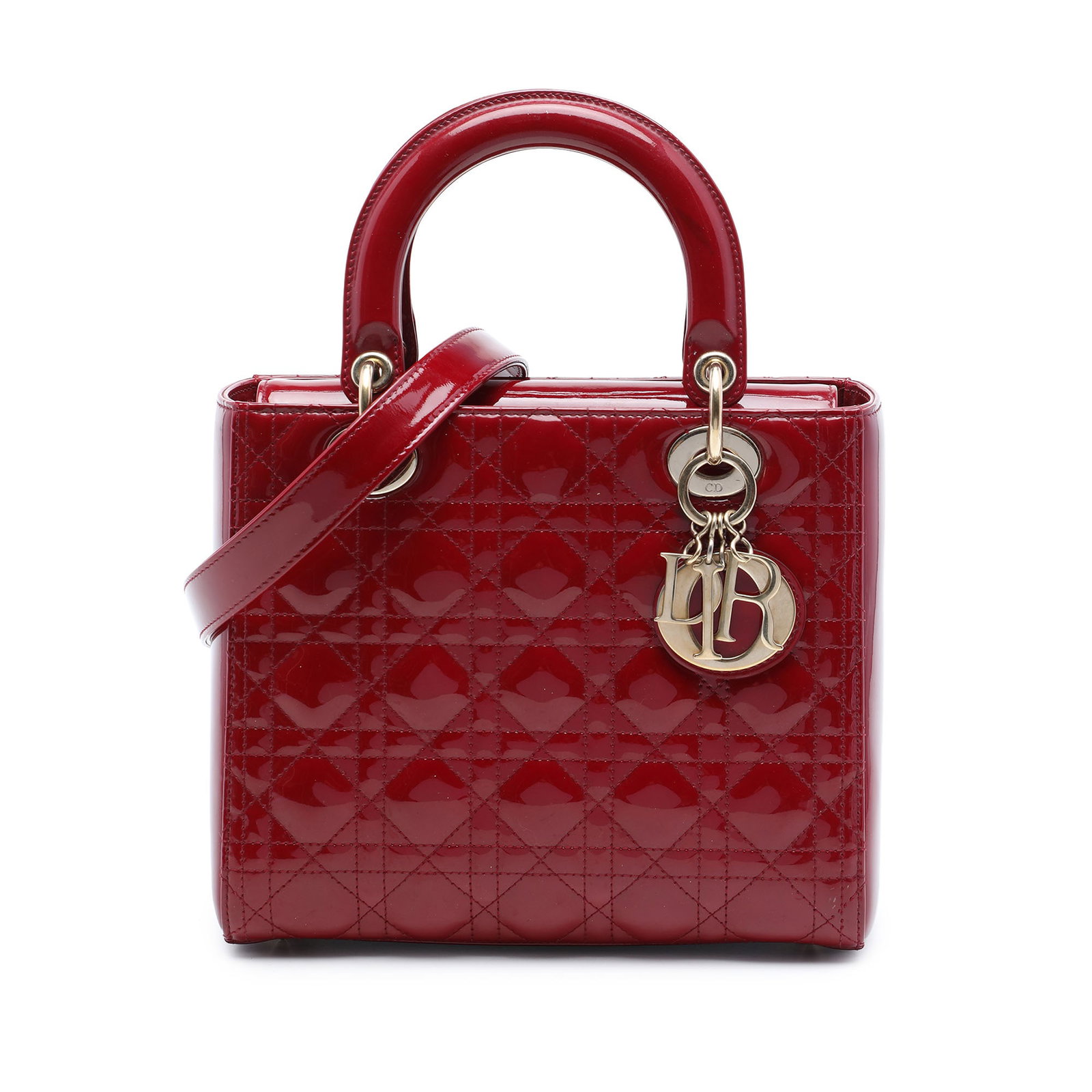Dior Lady Dior Medium Cannage Patent Leather Handbag Red: Dior Lady Dior Medium Cannage Patent Leather Handbag Red Medium Lady Dior bag in red patent leather with the signature Cannage quilted design. It features flat top handles, a detachable flat strap, a 