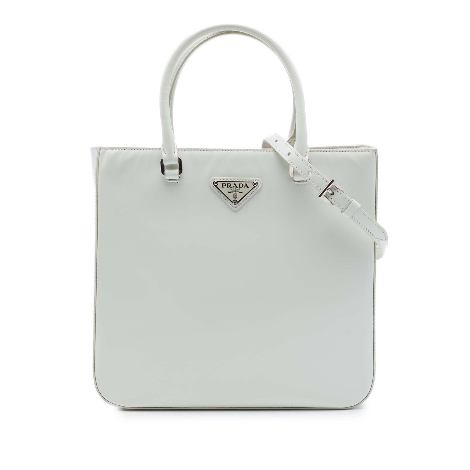 Prada Medium Spazzolato Satchel White Leather Top Handle Bag: Prada Medium Spazzolato Satchel White Leather Top Handle Bag Medium Spazzolato leather satchel with rolled leather handles, a detachable and adjustable flat strap, an open top, and an interior zip poc
