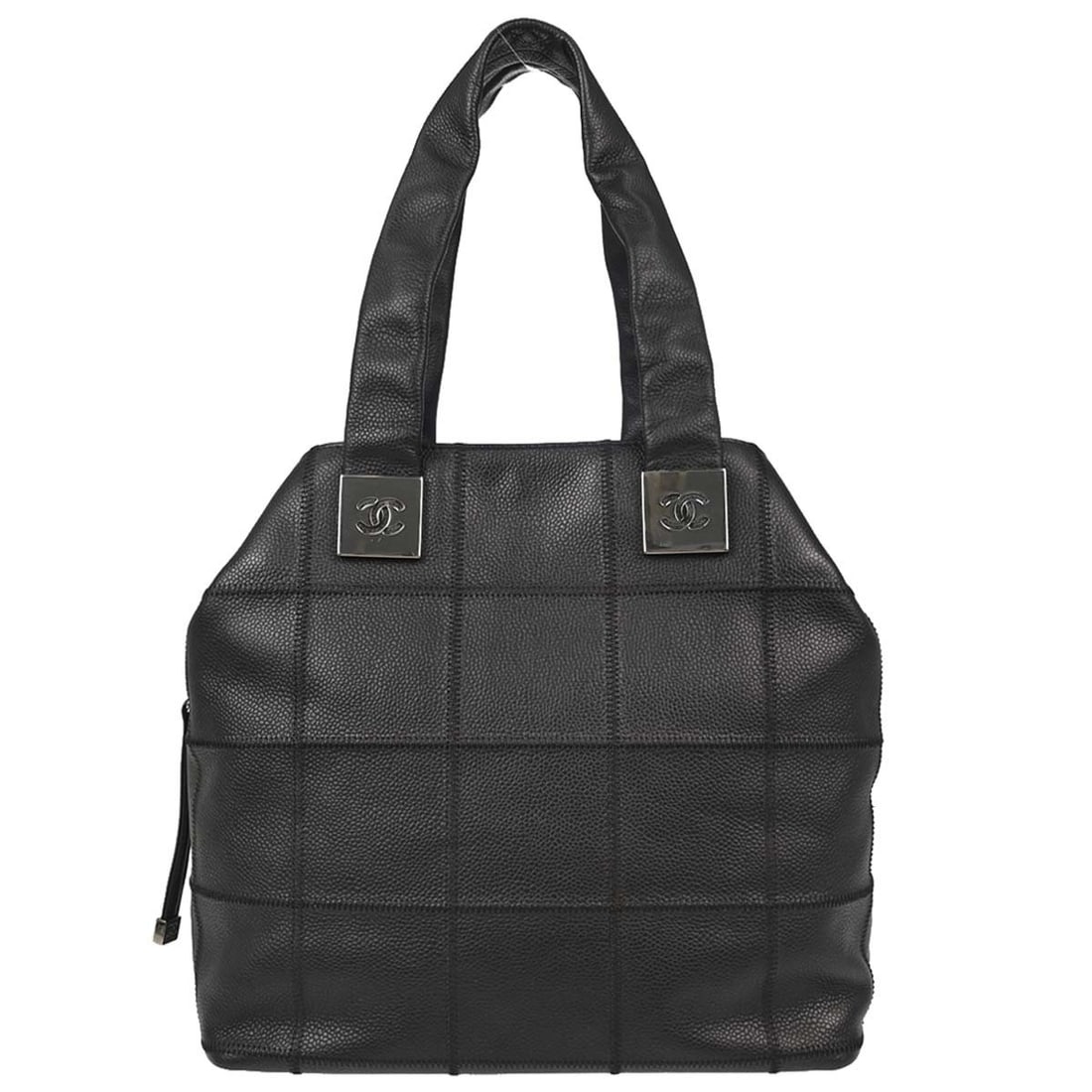 CHANEL Choco Bar top handle bag in black leather: CHANEL Choco Bar top handle bag in black leather Chanel Choco Bar handbag in black caviar skin leather with double handles and a zip closure. This medium top handle bag features two exterior pockets a