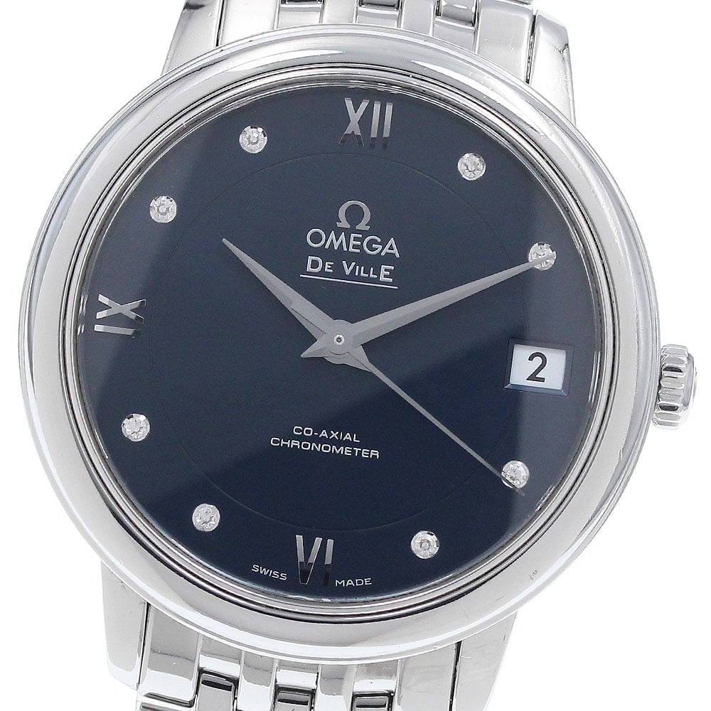 Omega De Ville Prestige 424.10.33.20.53.001 33mm Diamond Date Watch: Omega De Ville Prestige 424.10.33.20.53.001 33mm Diamond Date Watch OMEGA De Ville Prestige wristwatch with an automatic Co-Axial movement, navy dial, date display, and 8P diamond dial configuration. 