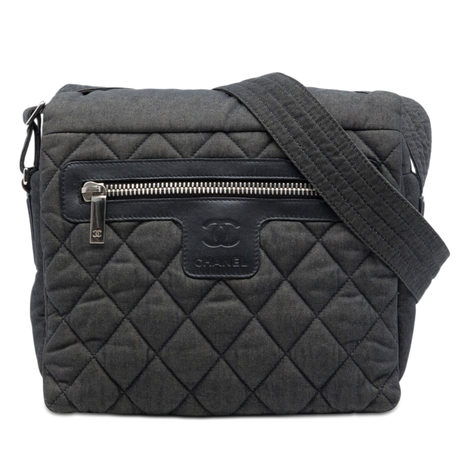 Chanel Coco Cocoon small denim crossbody messenger bag: Chanel Coco Cocoon small denim crossbody messenger bag A Chanel Coco Cocoon messenger bag crafted in quilted denim with a compact crossbody silhouette. It features an adjustable flat canvas shoulder s
