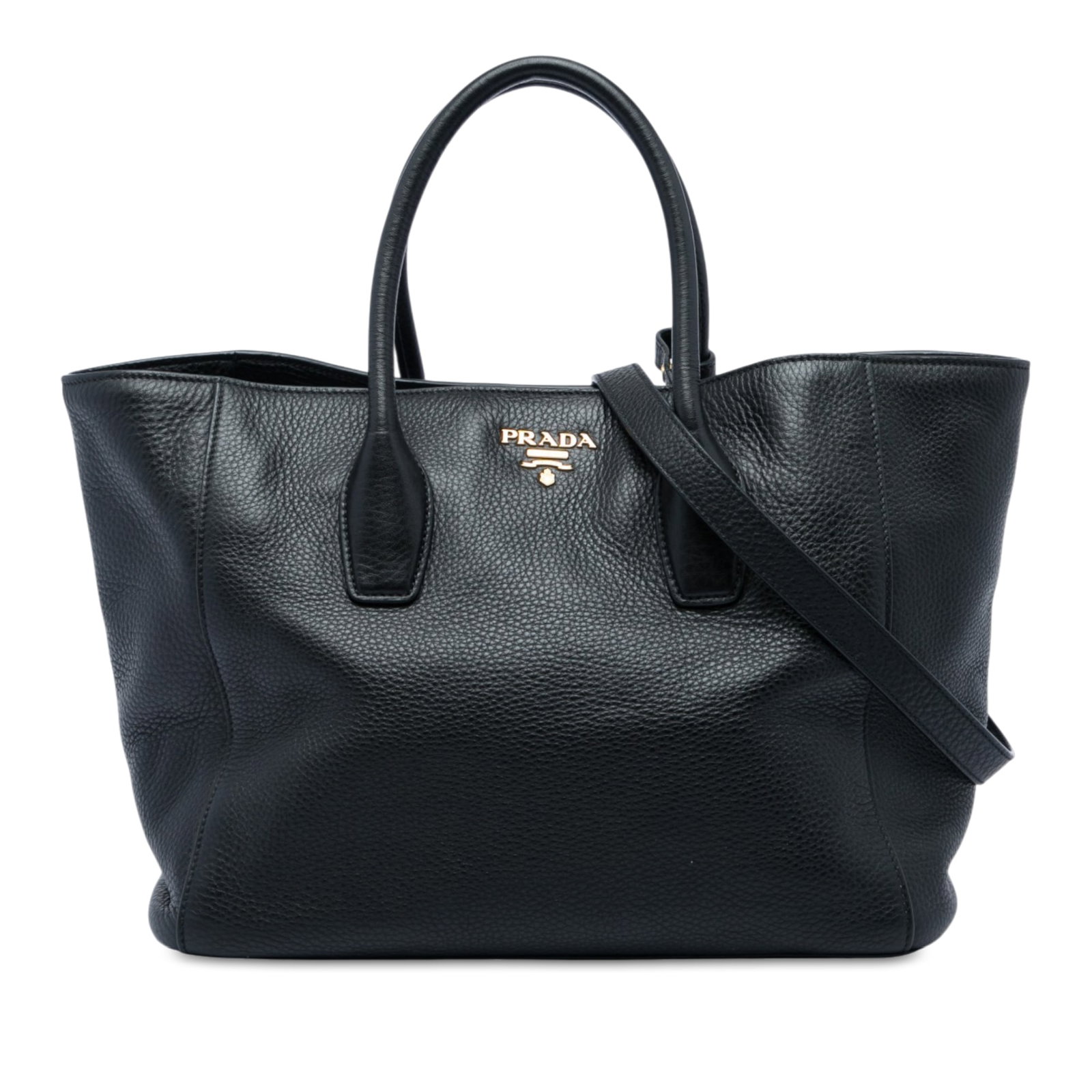 Prada Vitello Daino Leather Satchel with Shoulder Strap: Prada Vitello Daino Leather Satchel with Shoulder Strap Prada Vitello Daino Convertible Tote in black leather with rolled handles and an adjustable flat shoulder strap. The bag features an open top wi