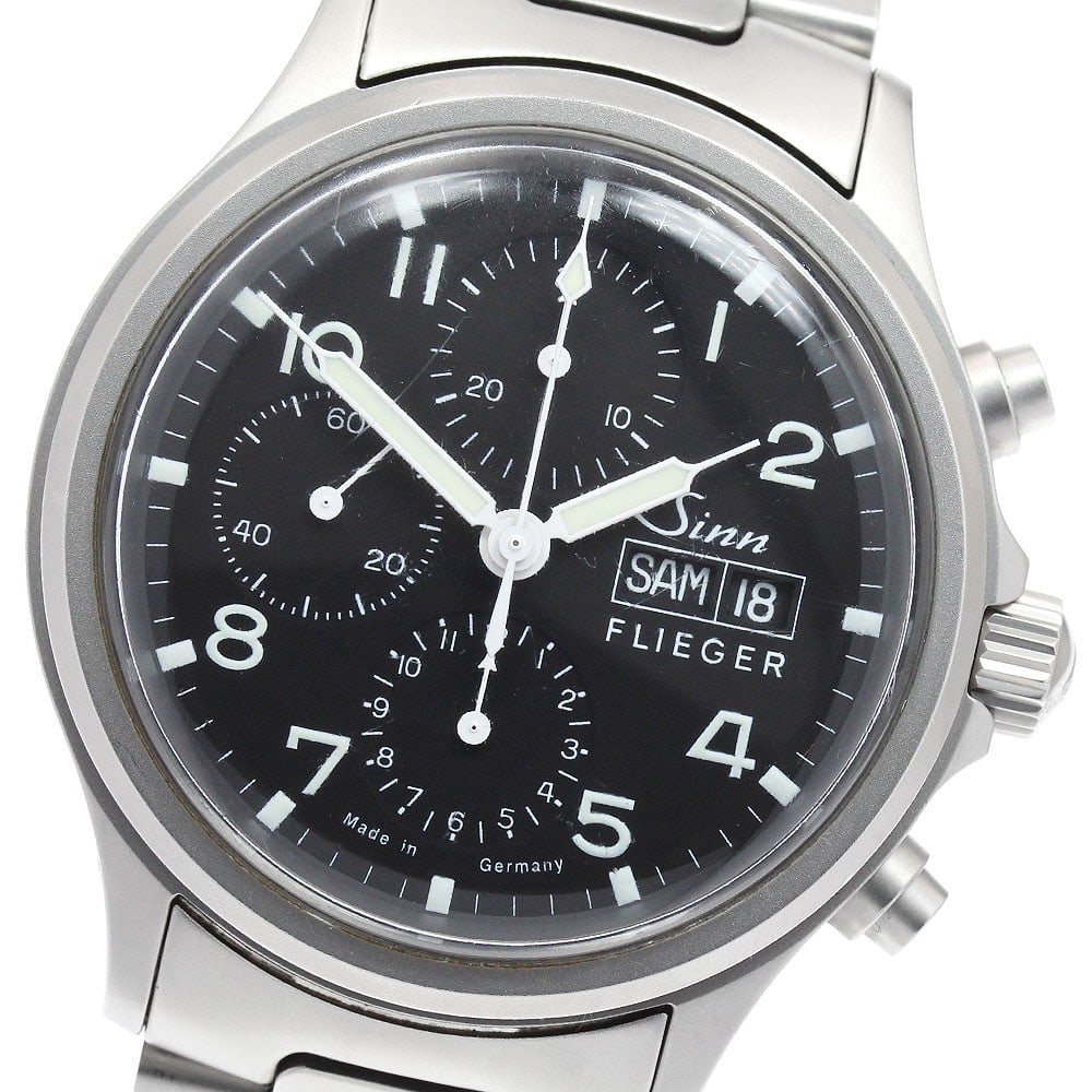 Sinn Flieger 358.FLIGER.M mens automatic chronograph day date watch: Sinn Flieger 358.FLIGER.M mens automatic chronograph day date watch Sinn Flieger automatic chronograph wristwatch for men with a black dial and stainless steel case and bracelet. This day-date model f
