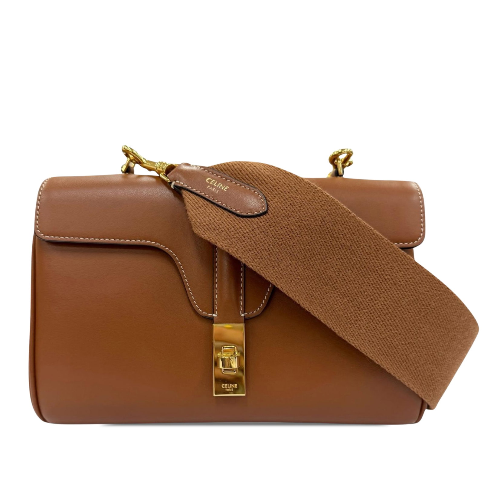Celine Soft 16 Teen Crossbody Bag in Brown Leather: Celine Soft 16 Teen Crossbody Bag in Brown Leather Celine Teen Smooth Calfskin Soft 16 Crossbody in brown leather with a structured flap front and turn-lock closure. The bag includes a detachable flat