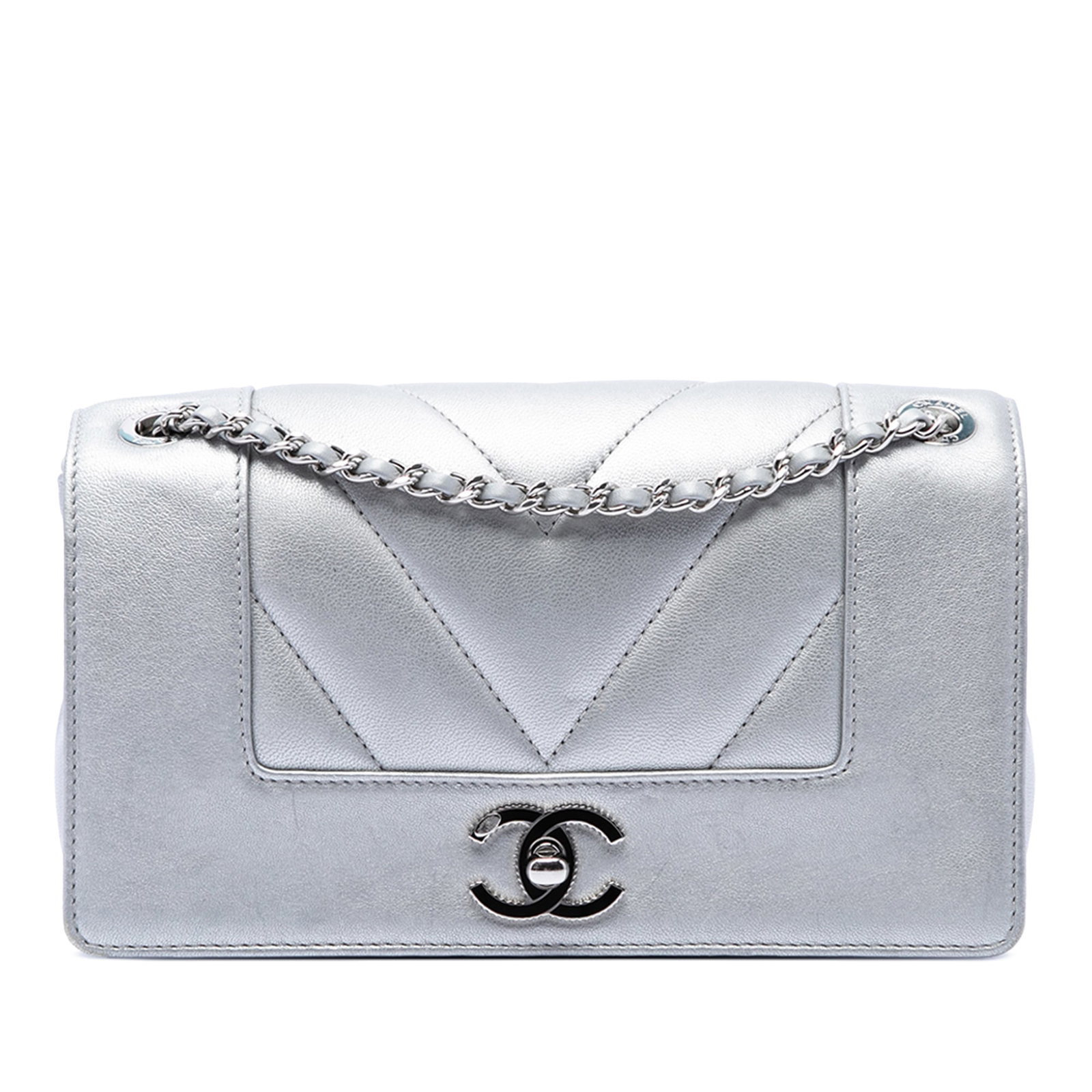 Chanel Mademoiselle Vintage Flap Mini Chevron Quilted Sheepskin Crossbody: Chanel Mademoiselle Vintage Flap Mini Chevron Quilted Sheepskin Crossbody Vintage Chanel Mademoiselle flap crossbody bag crafted in silver chevron-quilted sheepskin leather. It features a leather-wove