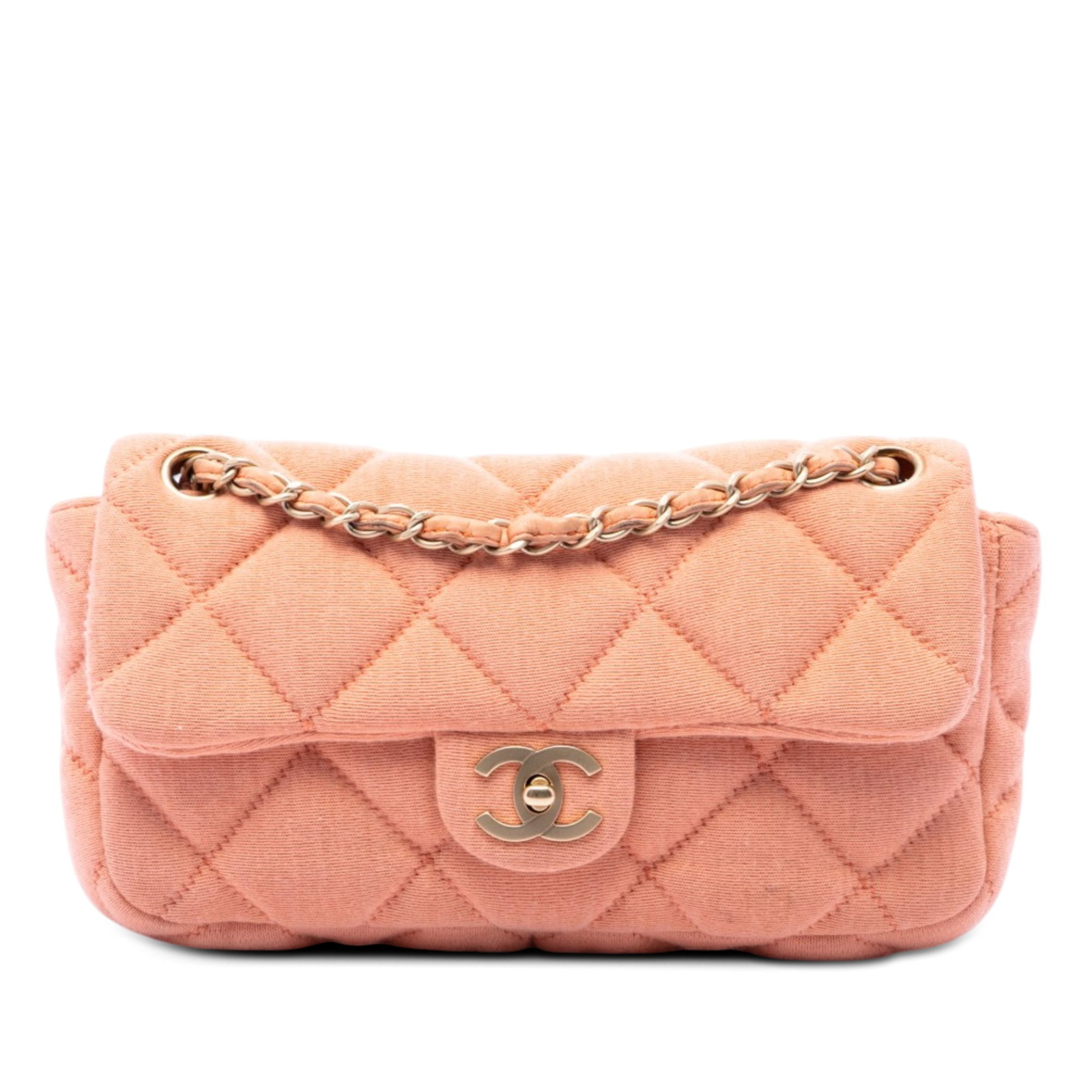 Chanel CC East West Flap Shoulder Bag Pink Quilted Jersey: Chanel CC East West Flap Shoulder Bag Pink Quilted Jersey A Chanel CC Quilted Jersey East West Flap shoulder bag in pink. This bag features a quilted fabric body, a leather-woven chain strap, a front 