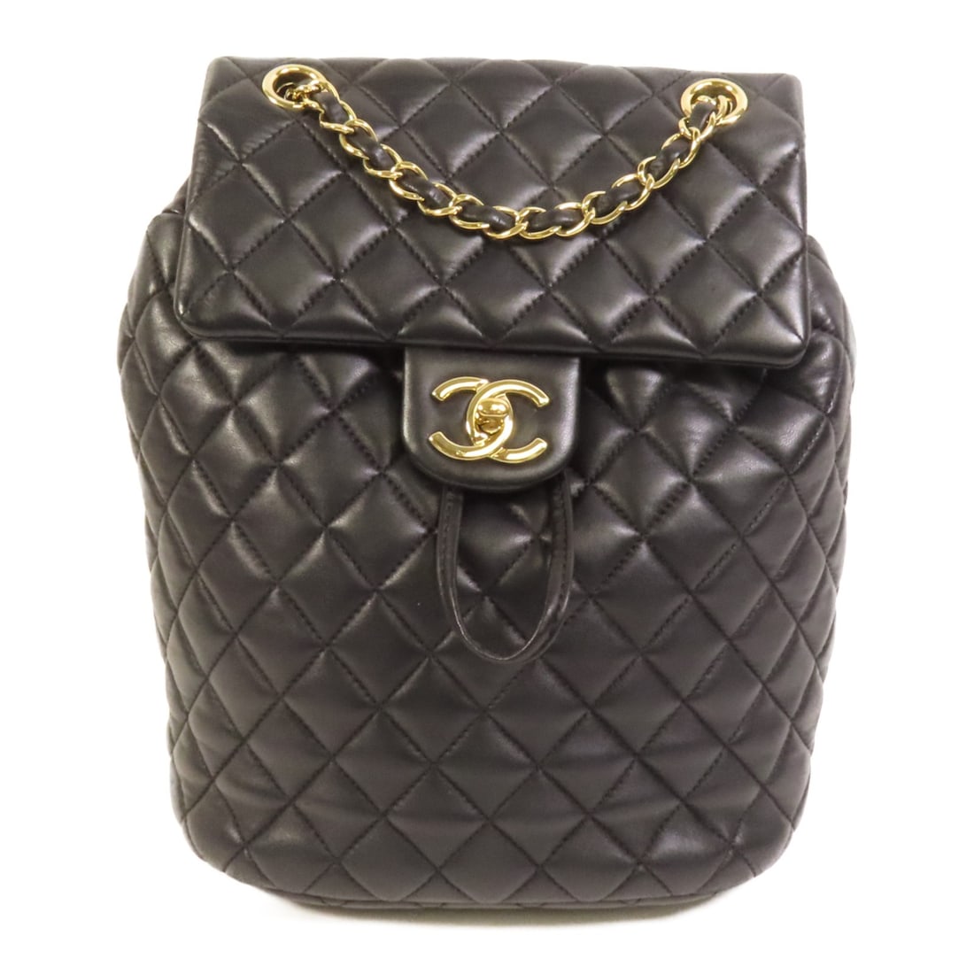 CHANEL CC lambskin backpack black with gold tone hardware: CHANEL CC lambskin backpack black with gold tone hardware Black Chanel CC rucksack backpack crafted in lambskin leather. This women's bag features a turn-lock closure, one exterior open pocket, and an