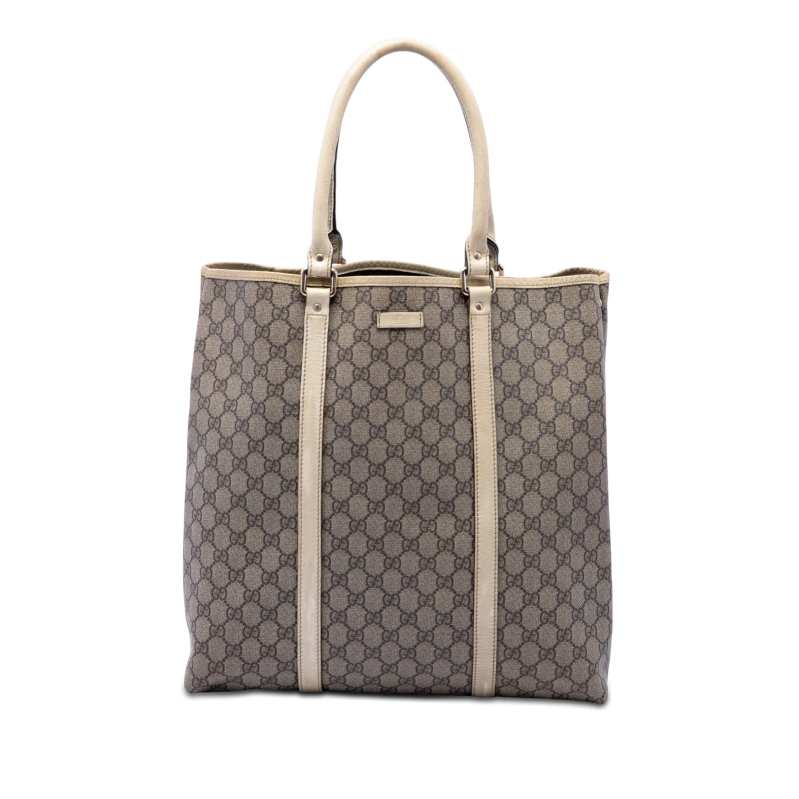 Gucci GG Supreme Joy Tote Beige Coated Canvas Leather Trim: Gucci GG Supreme Joy Tote Beige Coated Canvas Leather Trim Gucci GG Supreme Joy Vertical Tote in beige with a coated canvas body and leather trim. This tote features rolled leather handles, an open to