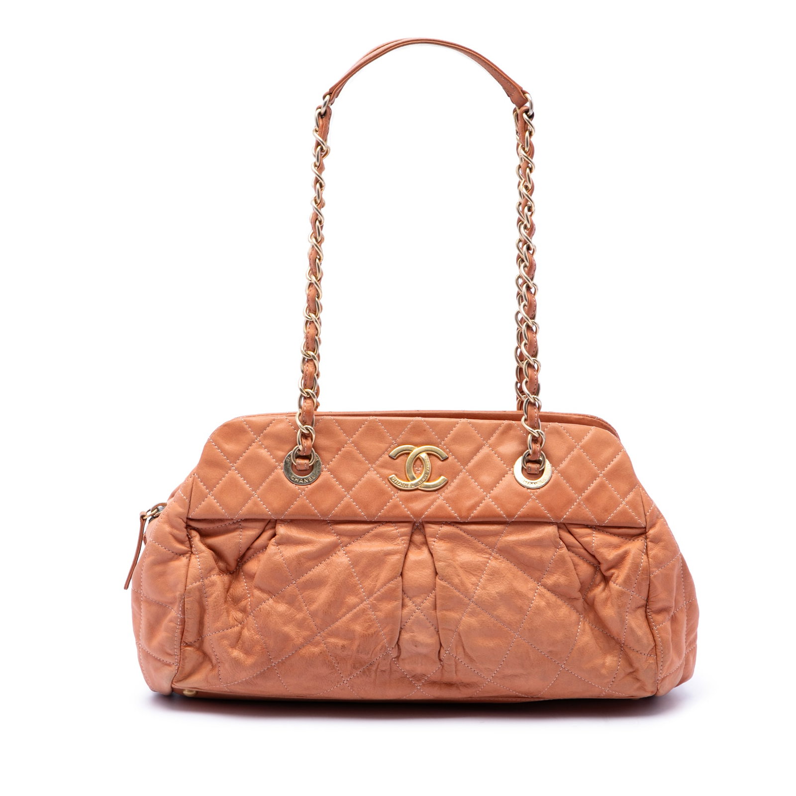 Chanel Chic Quilt Bowling Bag in Orange Iridescent Calfskin: Chanel Chic Quilt Bowling Bag in Orange Iridescent Calfskin A Chanel Chic Quilt Bowling Bag crafted in quilted iridescent calfskin leather with a structured silhouette. It features leather-woven chain