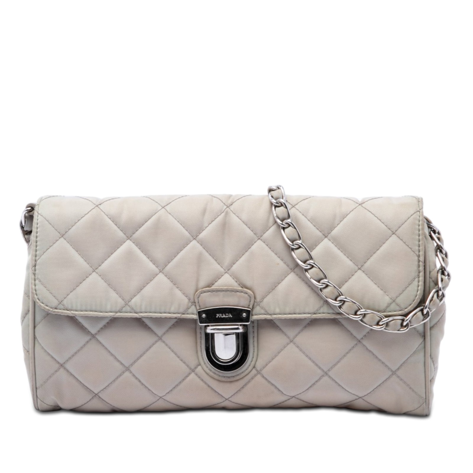 Prada Impuntu Tessuto flap crossbody bag in gray nylon: Prada Impuntu Tessuto flap crossbody bag in gray nylon Prada Impuntu Tessuto Chain Crossbody bag in gray with a quilted fabric body and nylon woven chain strap. The design features a front flap with p