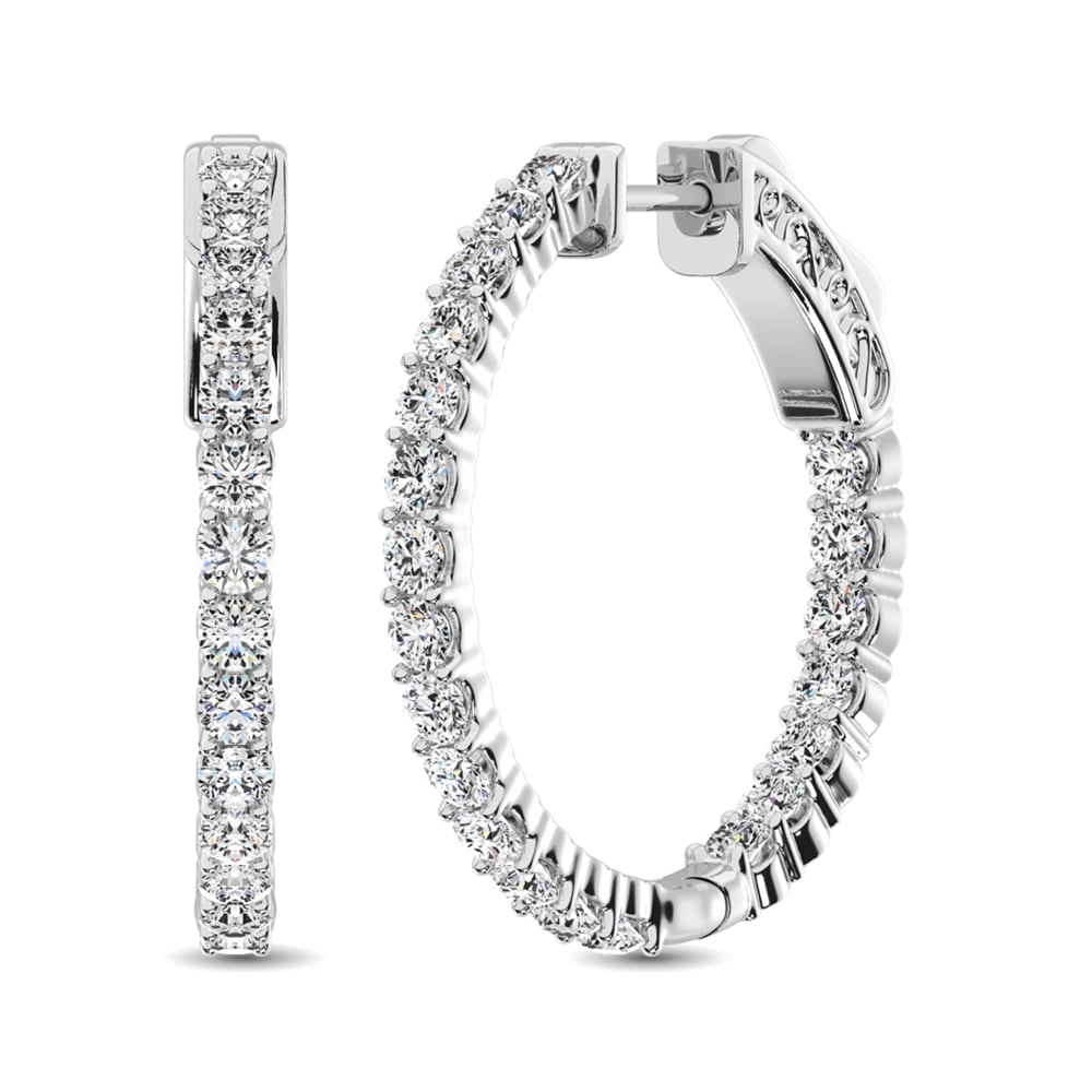 10K White Gold Diamond 2 Ct.Tw. In and Out Hoop Earrings: 10K White Gold Diamond 2 Ct.Tw. In and Out Hoop Earrings These stunning earrings are available in 10K White Gold. There are 21 round diamonds with a total carat weight of 2 Ct.Tw. set in a Prong setti