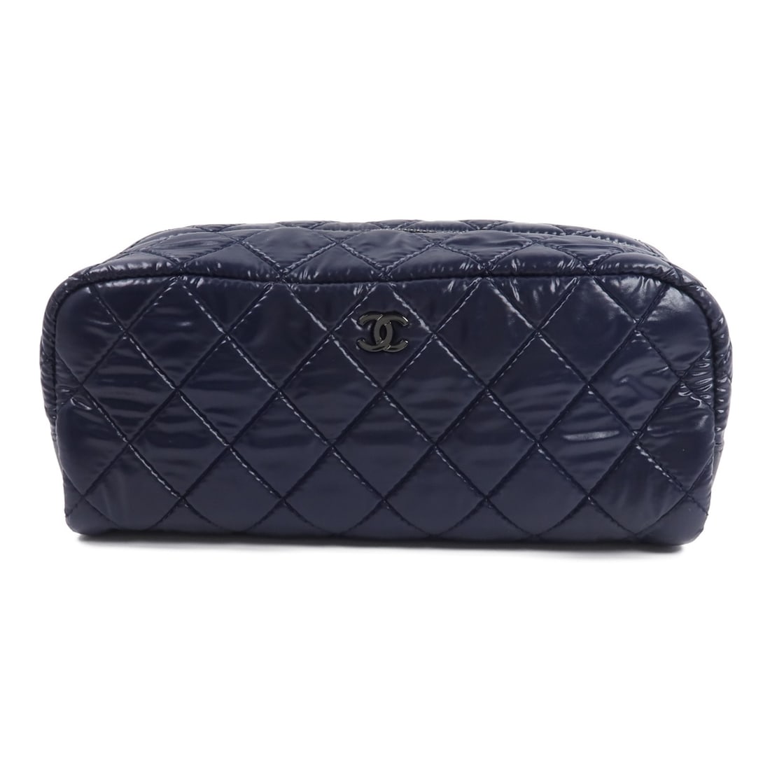 CHANEL Coco Cocoon CC Nylon Pouch Navy Blue: CHANEL Coco Cocoon CC Nylon Pouch Navy Blue CHANEL CC Coco Cocoon pouch in navy blue nylon. This women's pouch is made in France and features a zip-fastener closure. Includes hologram sticker and guar