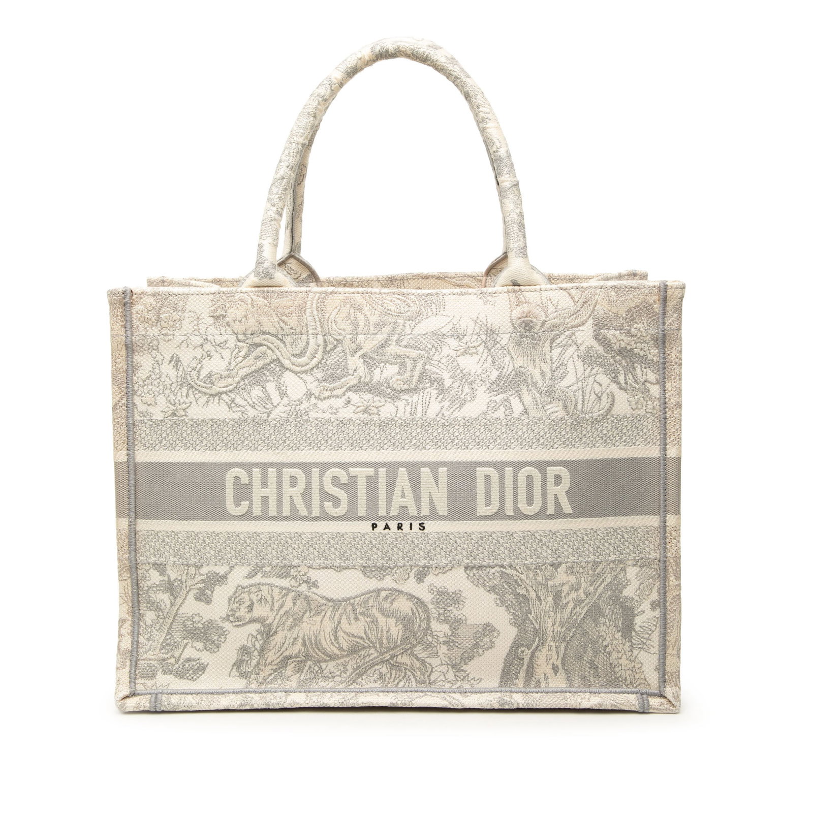 Dior Dioriviera Toile de Jouy Medium Book Tote Canvas: Dior Dioriviera Toile de Jouy Medium Book Tote Canvas Medium Dioriviera Toile de Jouy Book Tote in embroidered canvas with rolled handles and an open top. Made in Italy, this gray bag shows visible we