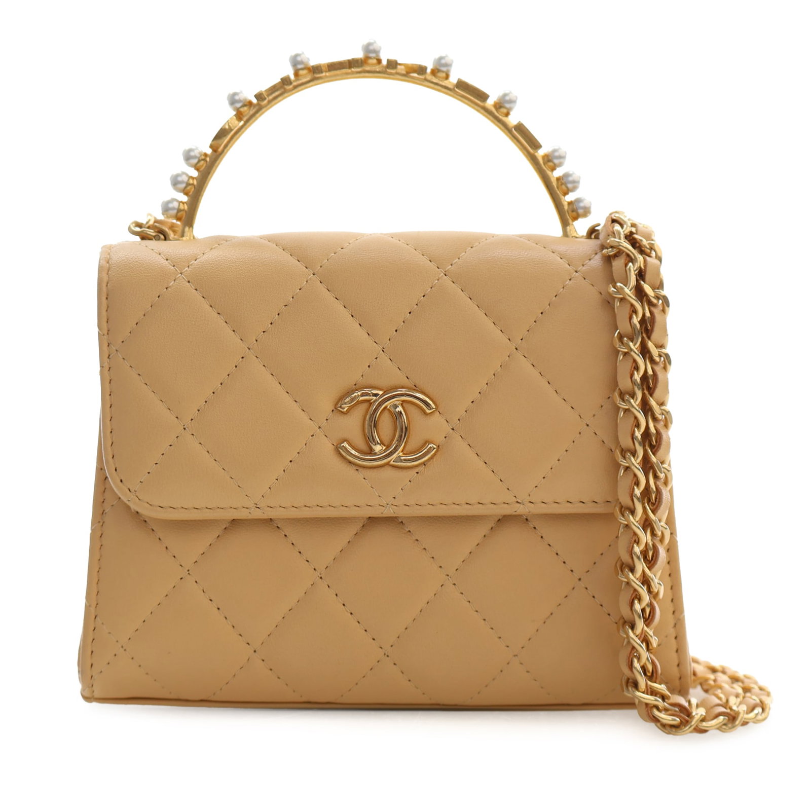 Chanel CC Faux Pearl Top Handle Flap Bag Quilted Lambskin: Chanel CC Faux Pearl Top Handle Flap Bag Quilted Lambskin A Chanel CC Quilted Lambskin Faux Pearl Top Handle Flap satchel in beige. This bag features a quilted lambskin leather body, a faux pearl embe