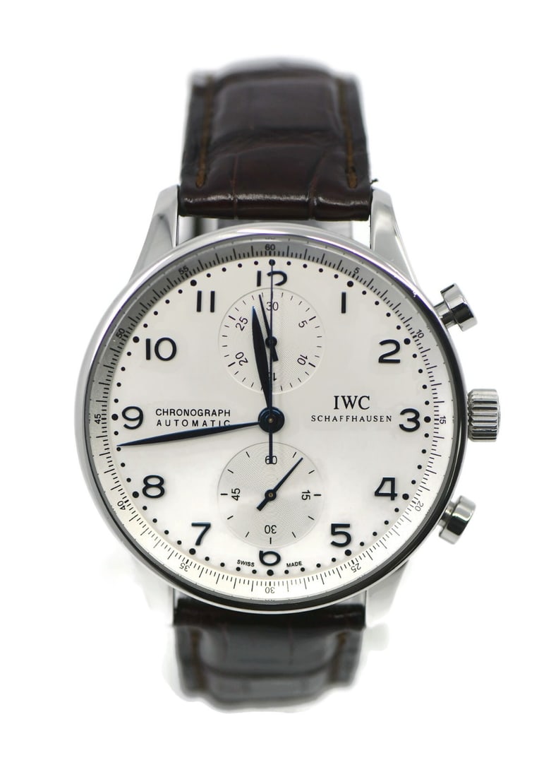 IWC IW371446 Portuguese Chronograph Mens Automatic Watch with Box Papers: IWC IW371446 Portuguese Chronograph Mens Automatic Watch with Box Papers IWC Portuguese Chronograph wristwatch with a stainless steel case, silver dial, and brown two-piece leather strap. This men's a