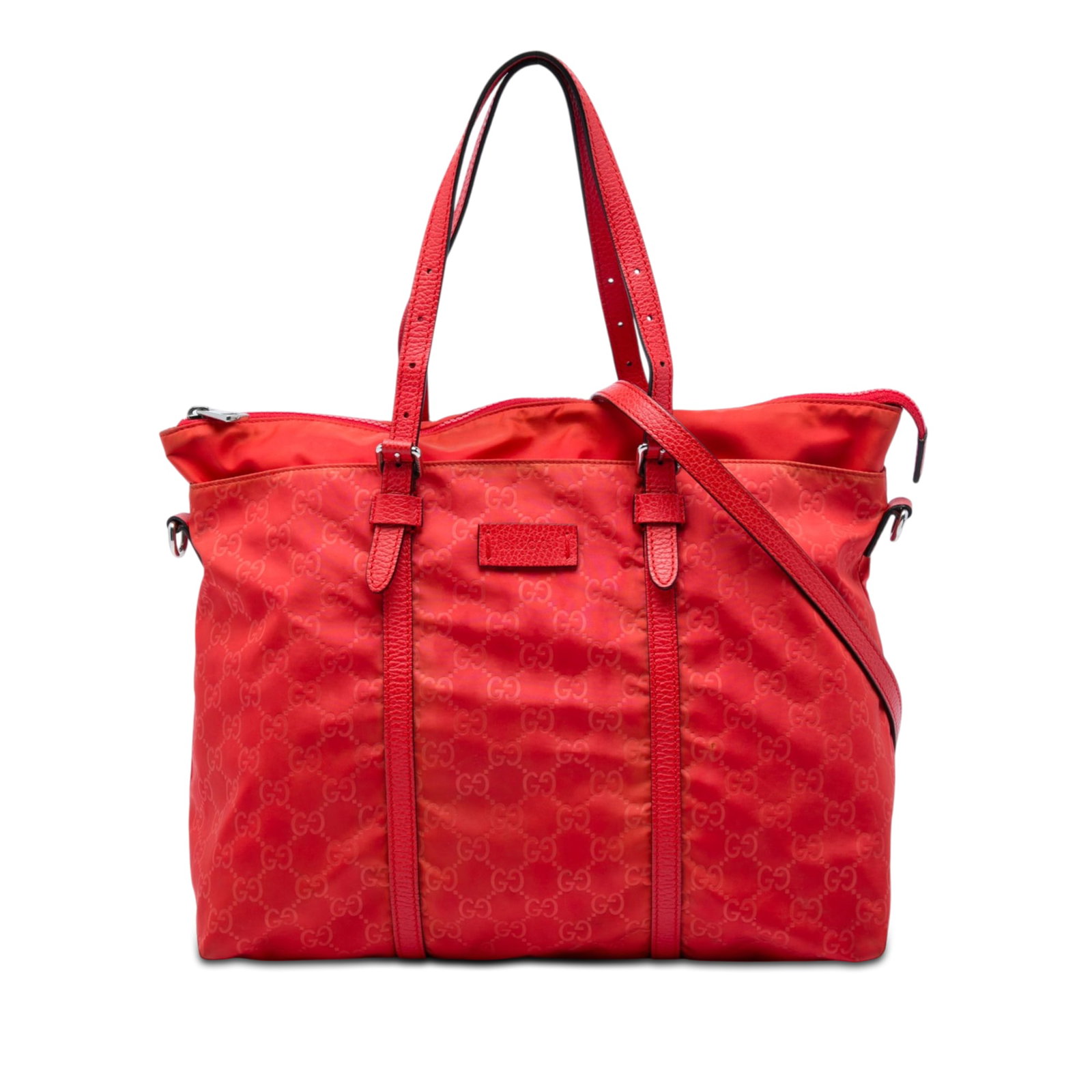 Gucci GG Nylon Satchel Red Fabric Bag with Leather Trim: Gucci GG Nylon Satchel Red Fabric Bag with Leather Trim Red Gucci GG Nylon Satchel crafted in nylon with leather trim. This satchel features adjustable flat leather handles, a detachable flat leather 