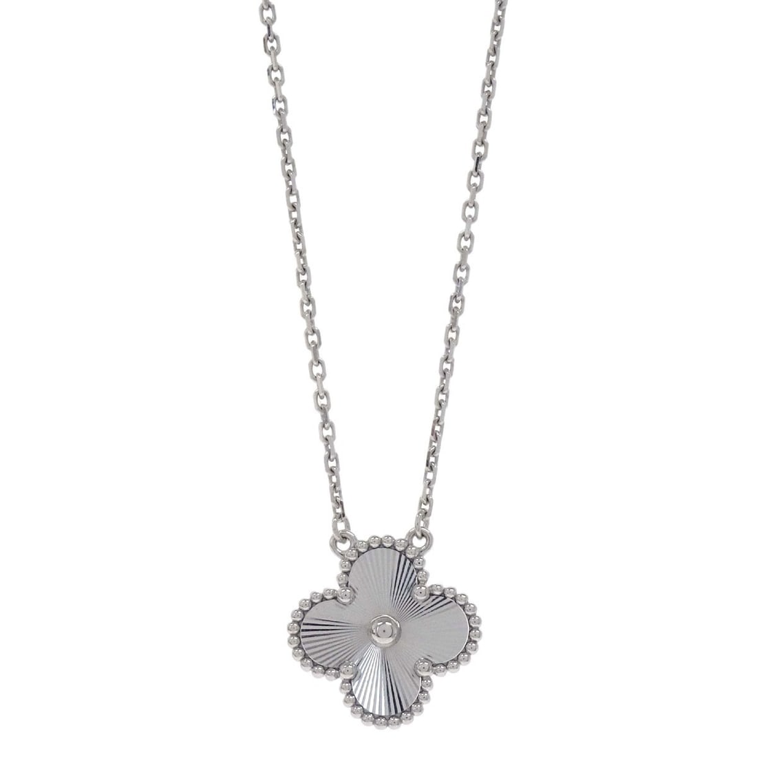 Van Cleef Arpels Vintage Alhambra white gold pendant necklace: Van Cleef Arpels Vintage Alhambra white gold pendant necklace Van Cleef & Arpels Vintage Alhambra guilloche pendant necklace crafted in Au750 white gold. This charm-style necklace features the iconic 