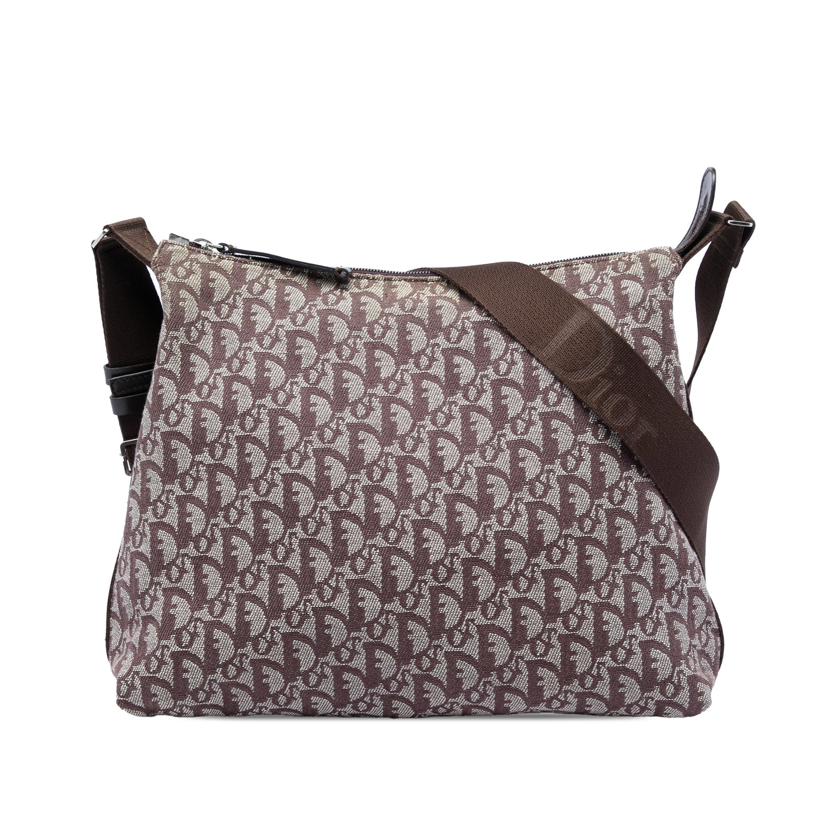 Dior Diorissimo Trotter Brown Canvas Crossbody Bag: Dior Diorissimo Trotter Brown Canvas Crossbody Bag Diorissimo Trotter canvas crossbody bag with an adjustable flat strap, top zip closure, and an interior zip pocket. Made in Italy. Condition B with