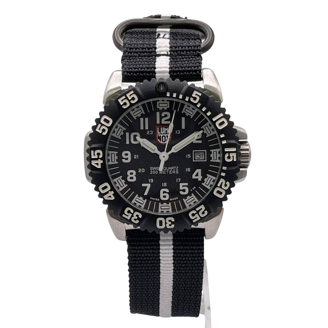 Luminox 3151 Colormark mens quartz watch steel case black dial nylon strap: Luminox 3151 Colormark mens quartz watch steel case black dial nylon strap Luminox Steel Colormark men's quartz watch with a black dial and nylon strap. This discontinued display model shows light
