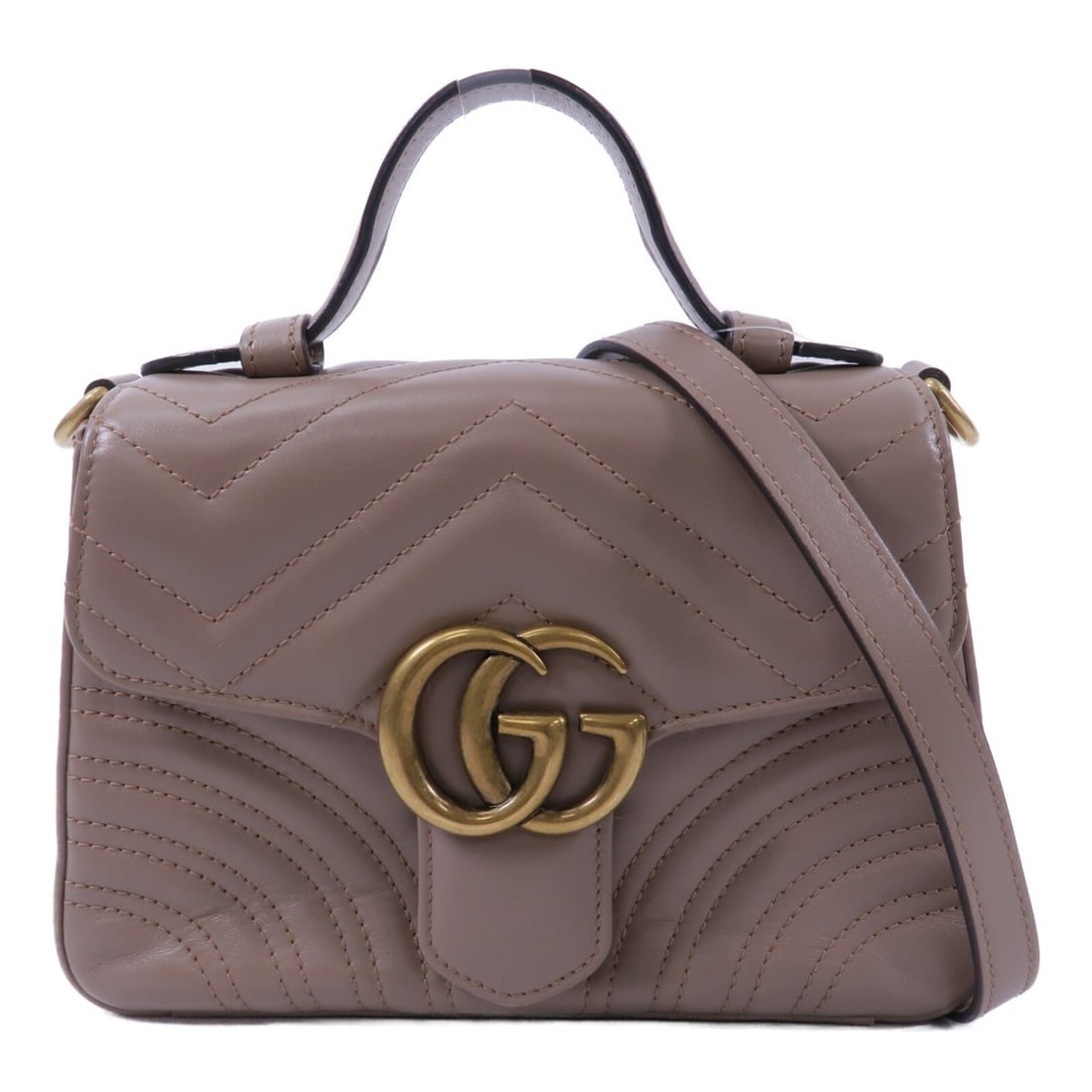 Gucci GG Marmont Mini Top Handle Bag 547260 Beige Calfskin: Gucci GG Marmont Mini Top Handle Bag 547260 Beige Calfskin Mini top handle 2-way shoulder bag from the GG Marmont line in beige calfskin. Designed for women, this bag features a structured flap silhou