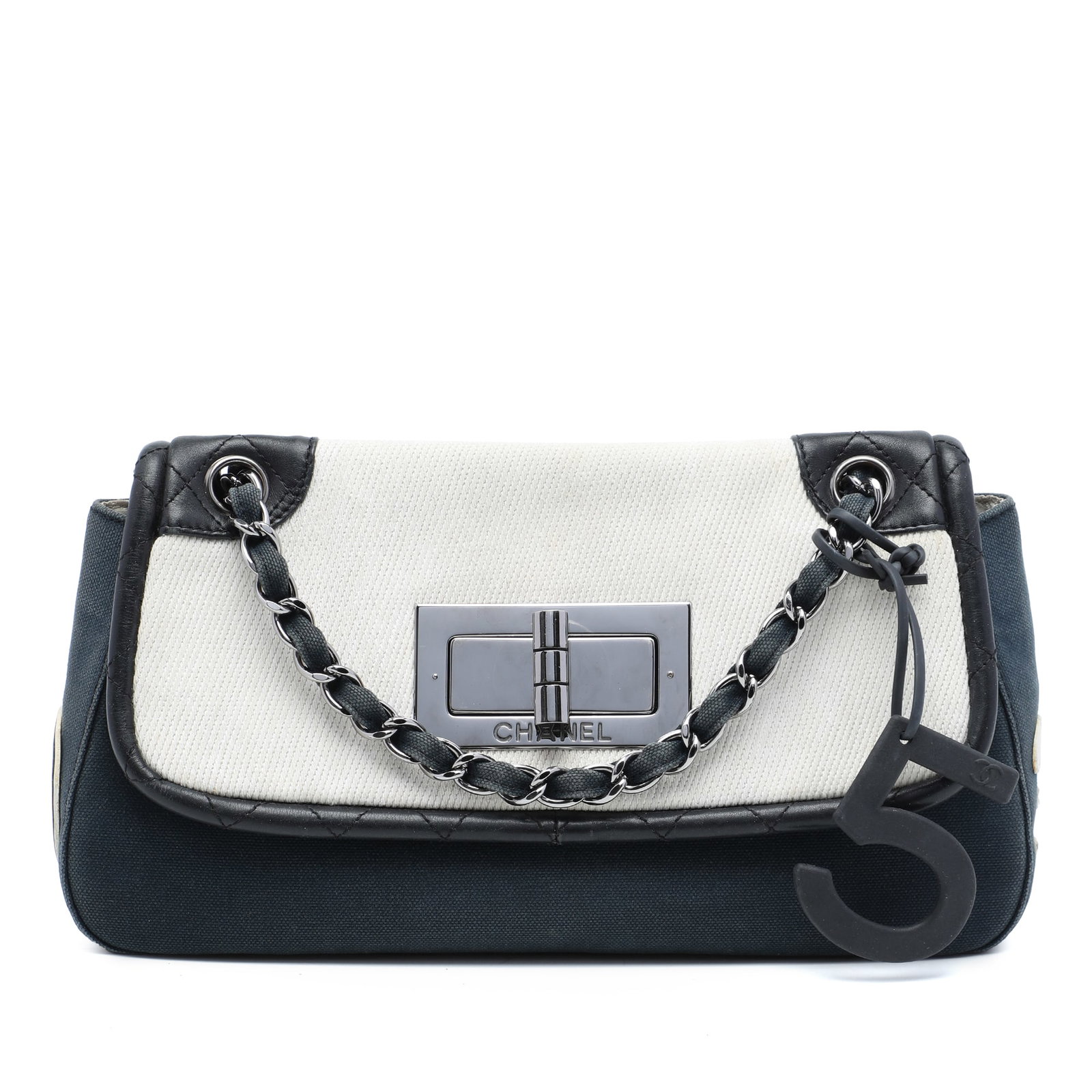Chanel No 5 Giant Mademoiselle Lock Flap Shoulder Bag: Chanel No 5 Giant Mademoiselle Lock Flap Shoulder Bag Shoulder bag in tricolor canvas and leather with leather-woven chain link shoulder straps and a front flap with twist lock closure. The bag also f