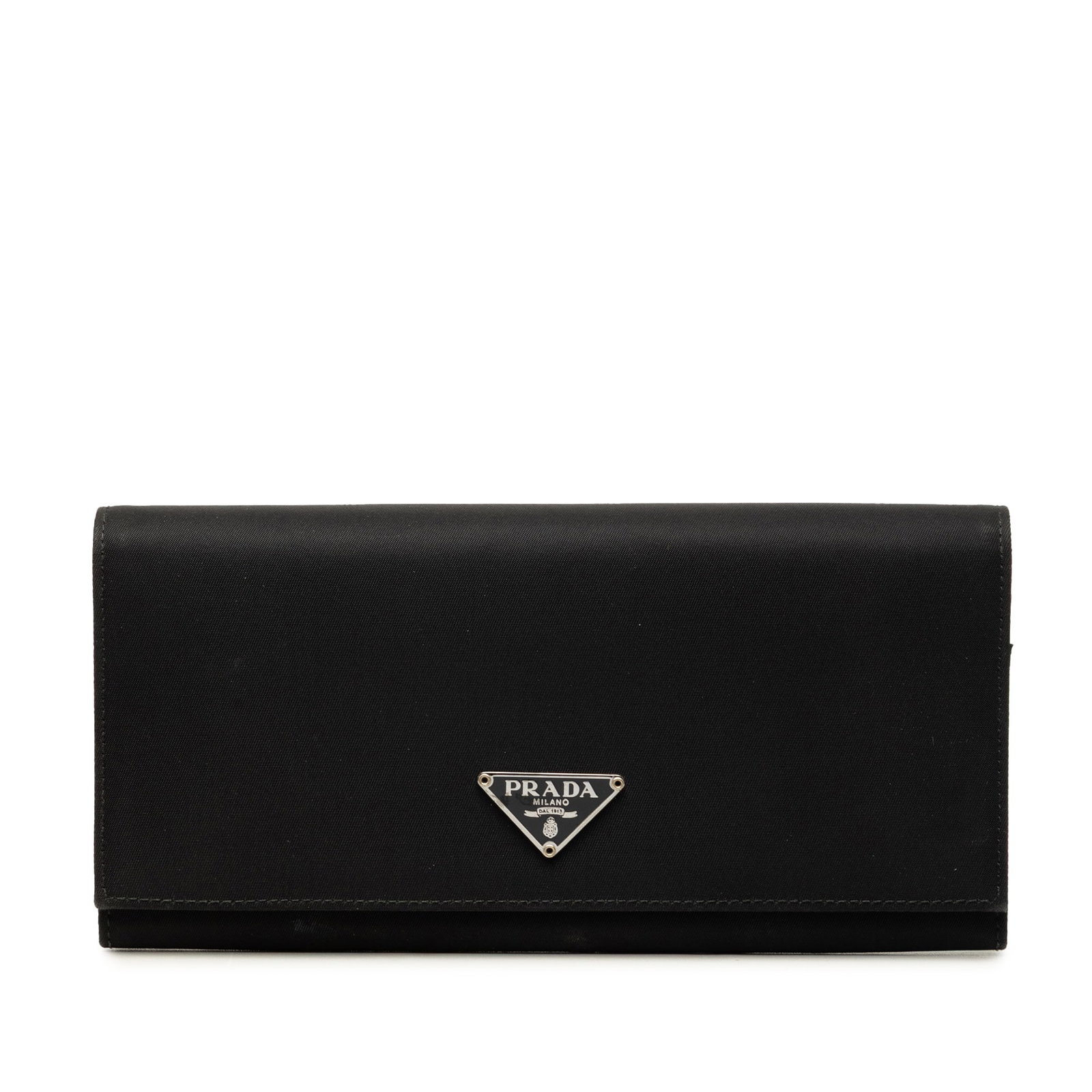 Prada Tessuto Black Nylon Flap Long Wallet: Prada Tessuto Black Nylon Flap Long Wallet Prada Tessuto Long Wallet in black fabric with a nylon body, front flap closure, and interior zip and slip pockets. Made in Italy. Condition B with visible w