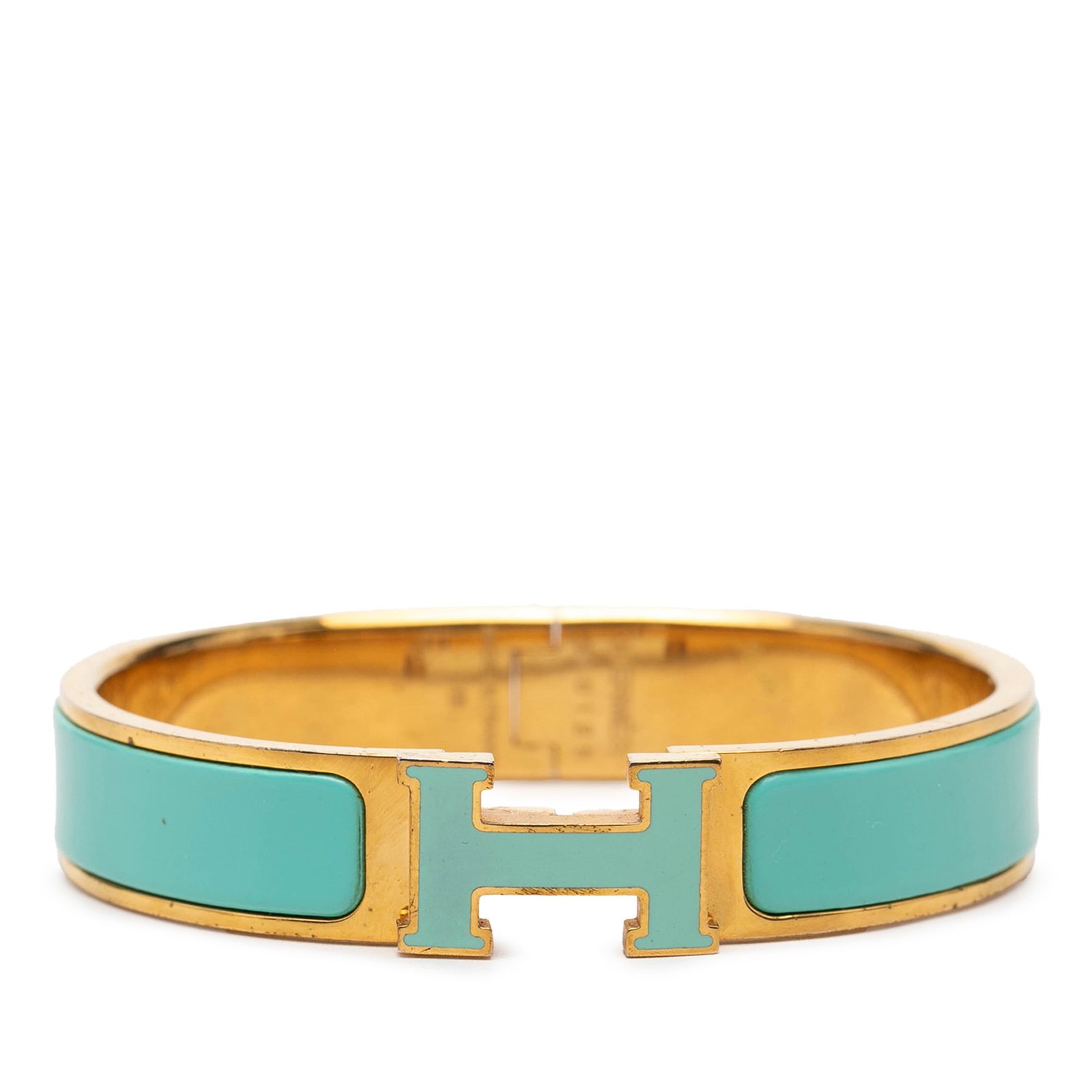 Hermes PM Narrow Enamel Clic H Bangle Blue: Hermes PM Narrow Enamel Clic H Bangle Blue Hermes Narrow Enamel Clic H Bracelet PM with a gold plated metal and enamel design and the signature H toggle clasp. This costume bracelet is made in France 