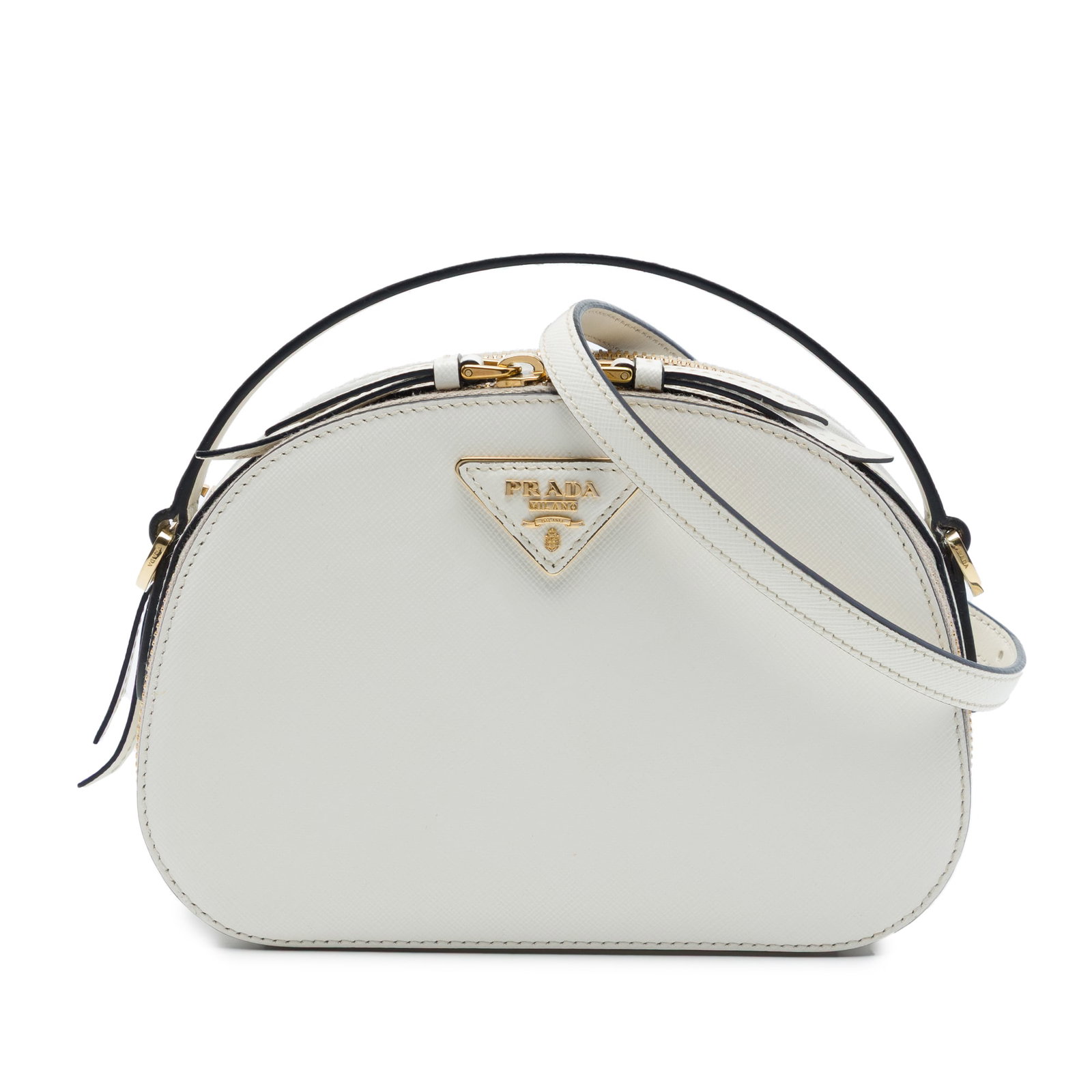 Prada Odette Satchel in White Saffiano Leather: Prada Odette Satchel in White Saffiano Leather Prada Saffiano Lux Odette satchel in white saffiano leather with a structured silhouette. It features a flat leather handle, a detachable flat leather st