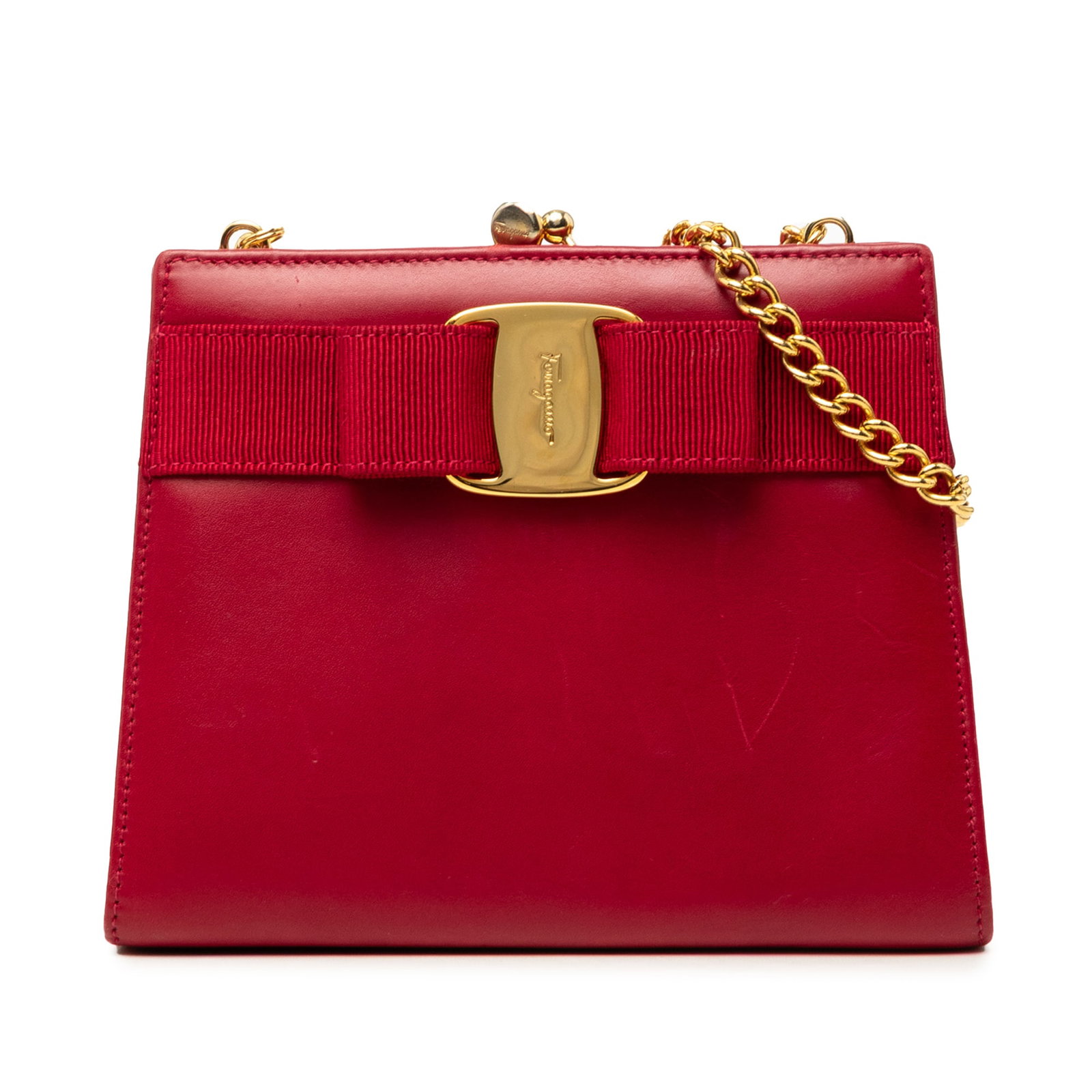Ferragamo Vara Bow Leather Chain Crossbody Bag Red: Ferragamo Vara Bow Leather Chain Crossbody Bag Red Ferragamo leather crossbody bag with the Vara bow detail, a chain link strap, and a top metal kiss lock closure. Made in Italy in red leather, this b