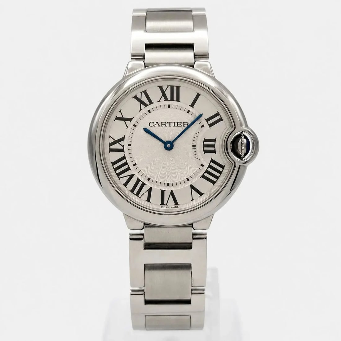 Cartier Ballon Bleu quartz wristwatch 36mm steel silver dial: Cartier Ballon Bleu quartz wristwatch 36mm steel silver dial Cartier Ballon Bleu wristwatch with a guilloche silver dial and Roman numeral hour markers. This pre-owned luxury watch features a quartz S