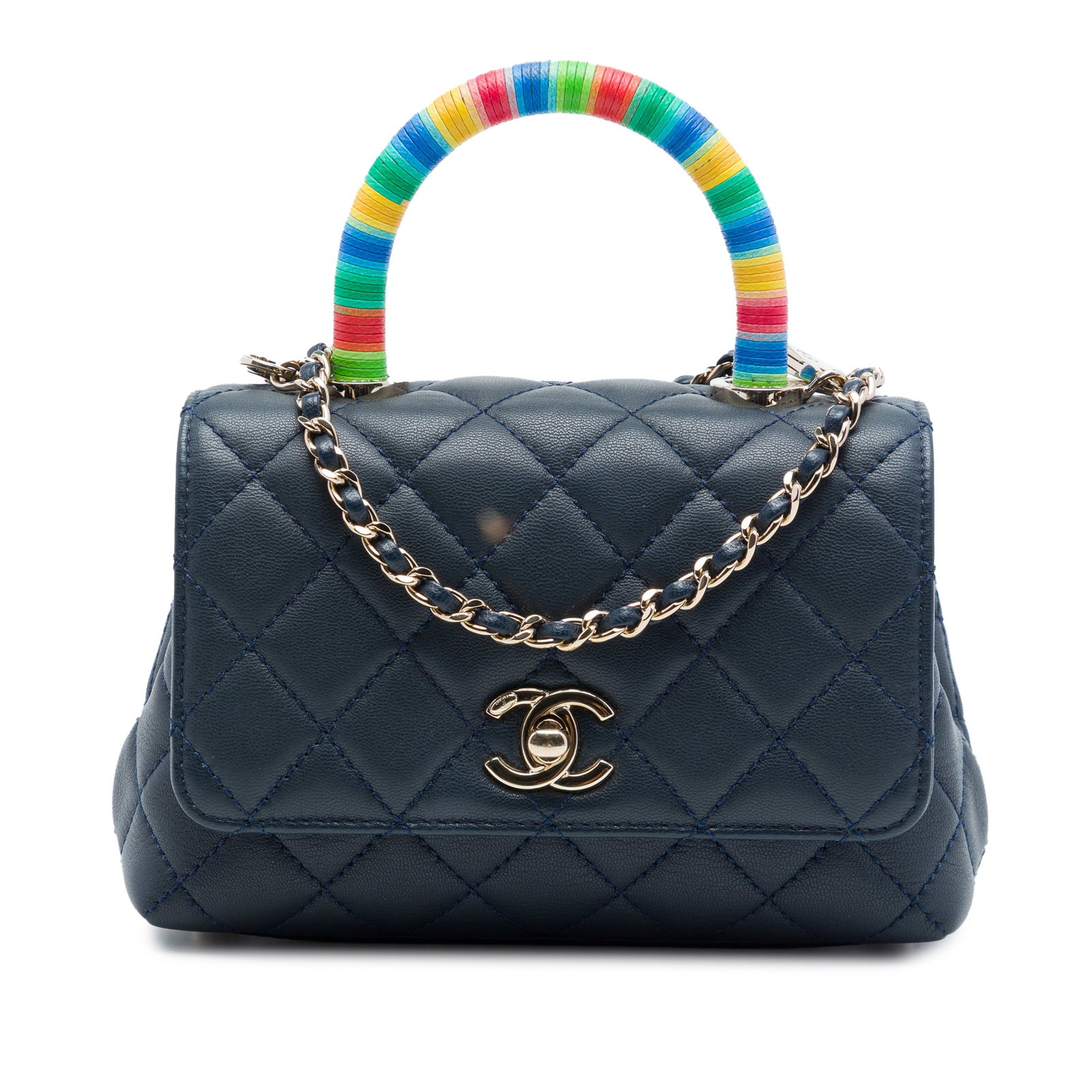 Chanel Rainbow Coco Extra Mini Top Handle Satchel Blue Lambskin: Chanel Rainbow Coco Extra Mini Top Handle Satchel Blue Lambskin A Chanel Extra Mini Coco Top Handle bag crafted in blue quilted lambskin leather. This satchel features a rolled top handle, a detachabl