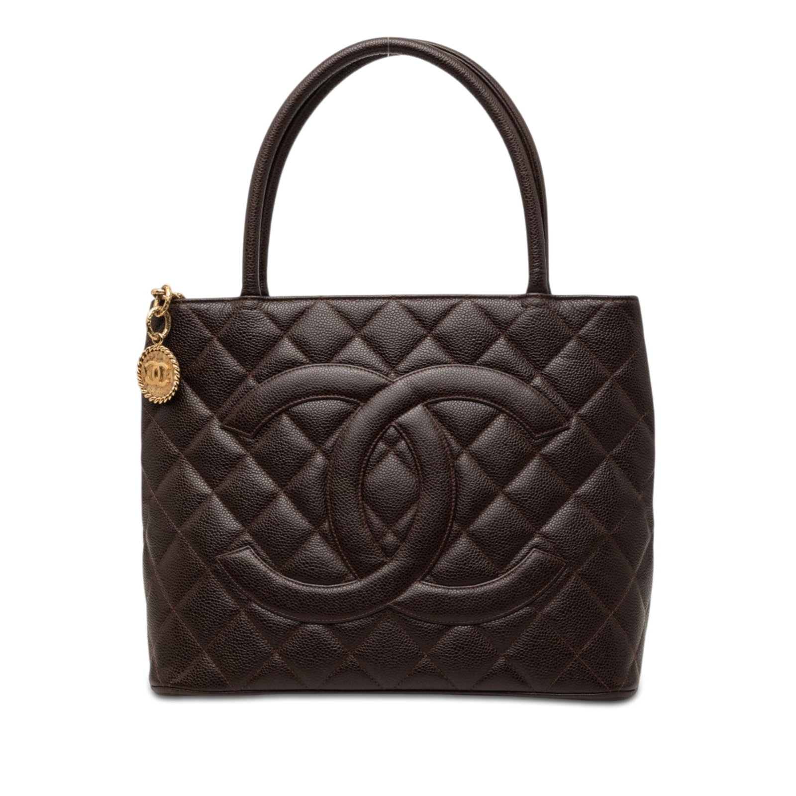 Chanel Medallion Tote Brown Caviar Leather Handbag: Chanel Medallion Tote Brown Caviar Leather Handbag A Chanel Medallion tote crafted in brown quilted caviar leather. This tote features rolled leather handles, a top zip closure, an exterior back slip 