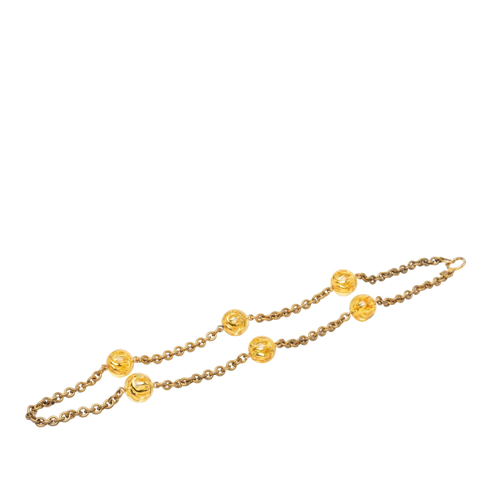 Chanel CC Ball Station Necklace Gold Tone Resin Lucite: Chanel CC Ball Station Necklace Gold Tone Resin Lucite Long Chanel station necklace featuring a gold-tone chain with resin lucite ball details and a spring ring closure. The piece shows visible wear i