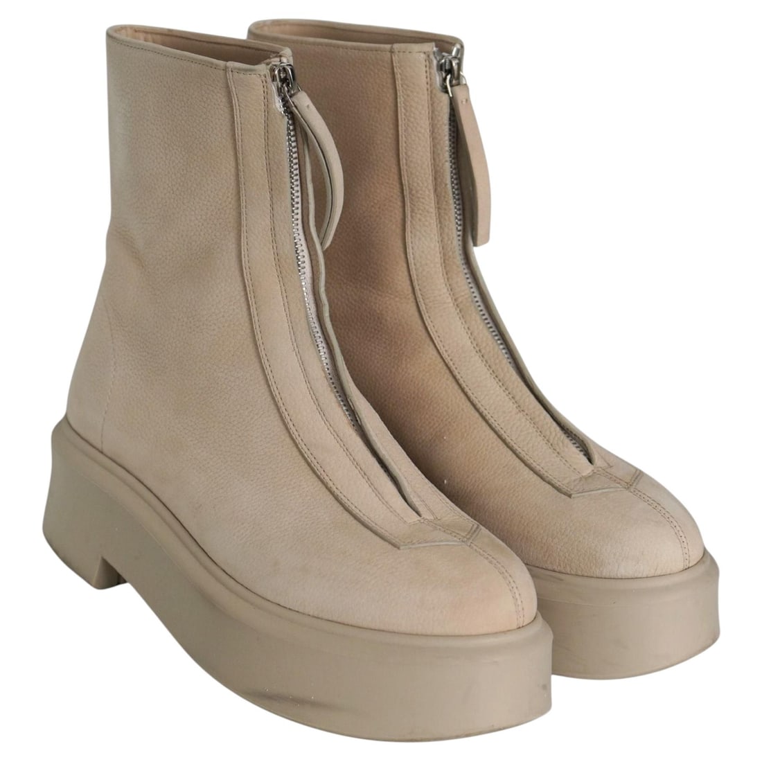 The Row Zipped 1 ankle boots in nubuck size 39: The Row Zipped 1 ankle boots in nubuck size 39 The Row Zipped 1 combat boots feature a chunky ankle-boot silhouette with a front zip fastening for easy on and off. Made in Italy from textured nubuck w