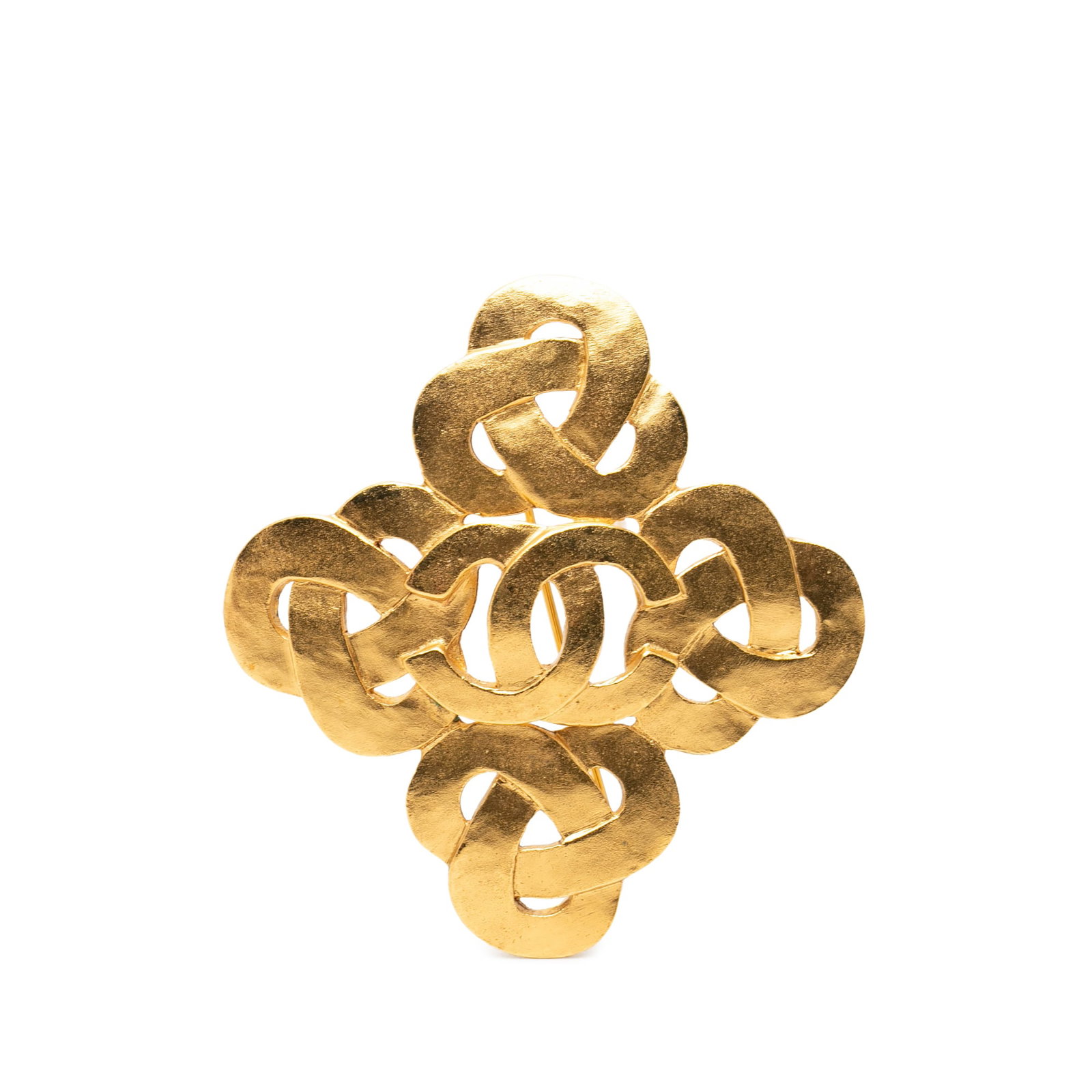 Chanel CC Twisted Gold Plated Metal Brooch: Chanel CC Twisted Gold Plated Metal Brooch Chanel CC twisted brooch in gold plated metal with a back pin closure. Made in France, this costume jewelry piece features the iconic CC motif with a texture