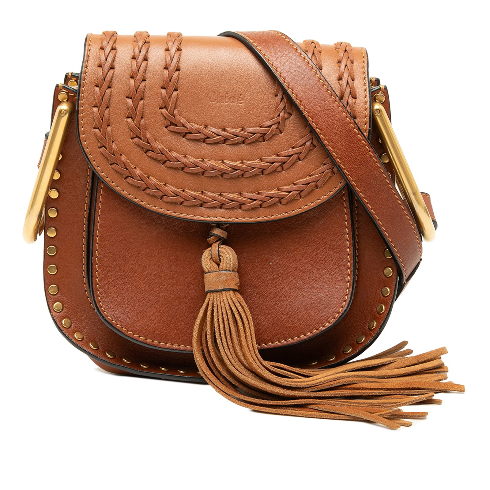 Chloe Hudson Small Brown Leather Crossbody Bag: Chloe Hudson Small Brown Leather Crossbody Bag A Chloe Small Leather Braided Hudson Crossbody crafted in brown leather with stud accents and tassel detail. The design features an adjustable flat leath