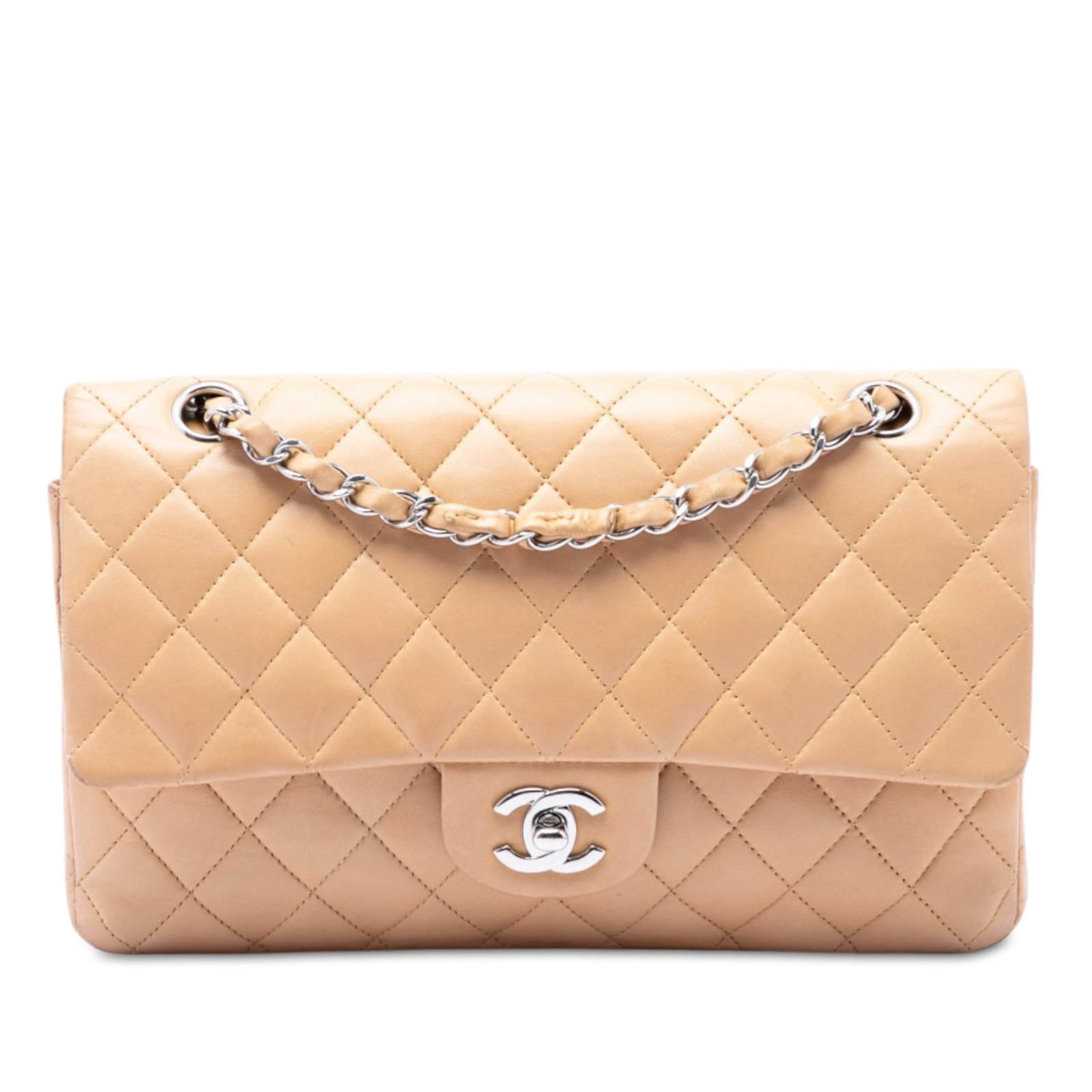 Chanel Medium Classic Double Flap Shoulder Bag Beige Lambskin: Chanel Medium Classic Double Flap Shoulder Bag Beige Lambskin A Chanel Medium Classic Lambskin Double Flap shoulder bag in beige. This bag features a quilted lambskin body, leather-woven chain straps,