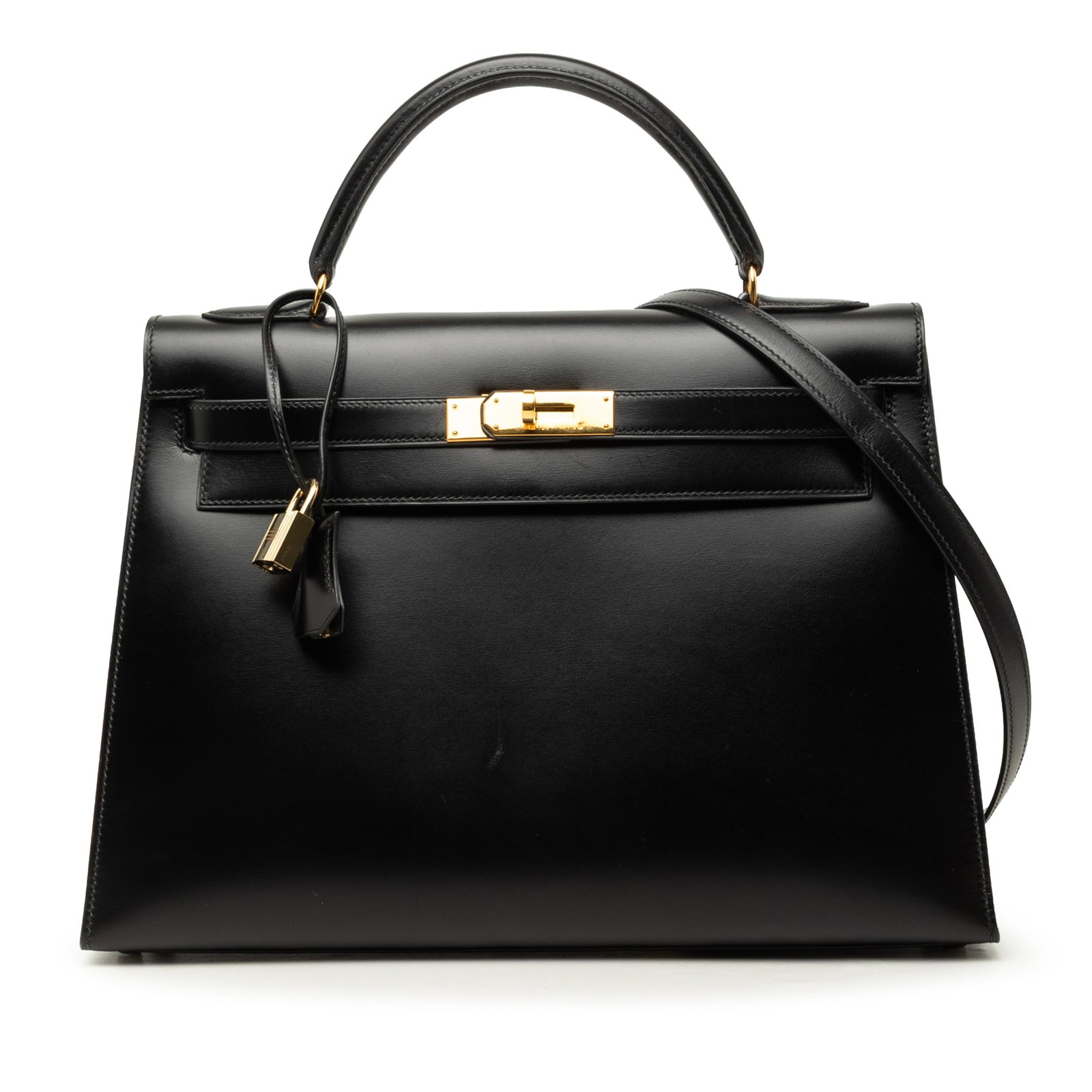Hermes Kelly Sellier 32 Box Calf Leather Handbag Noir: Hermes Kelly Sellier 32 Box Calf Leather Handbag Noir Hermes Kelly Sellier 32 handbag crafted in Noir Box Calf leather with a structured silhouette. It features a flat top handle, a detachable flat le