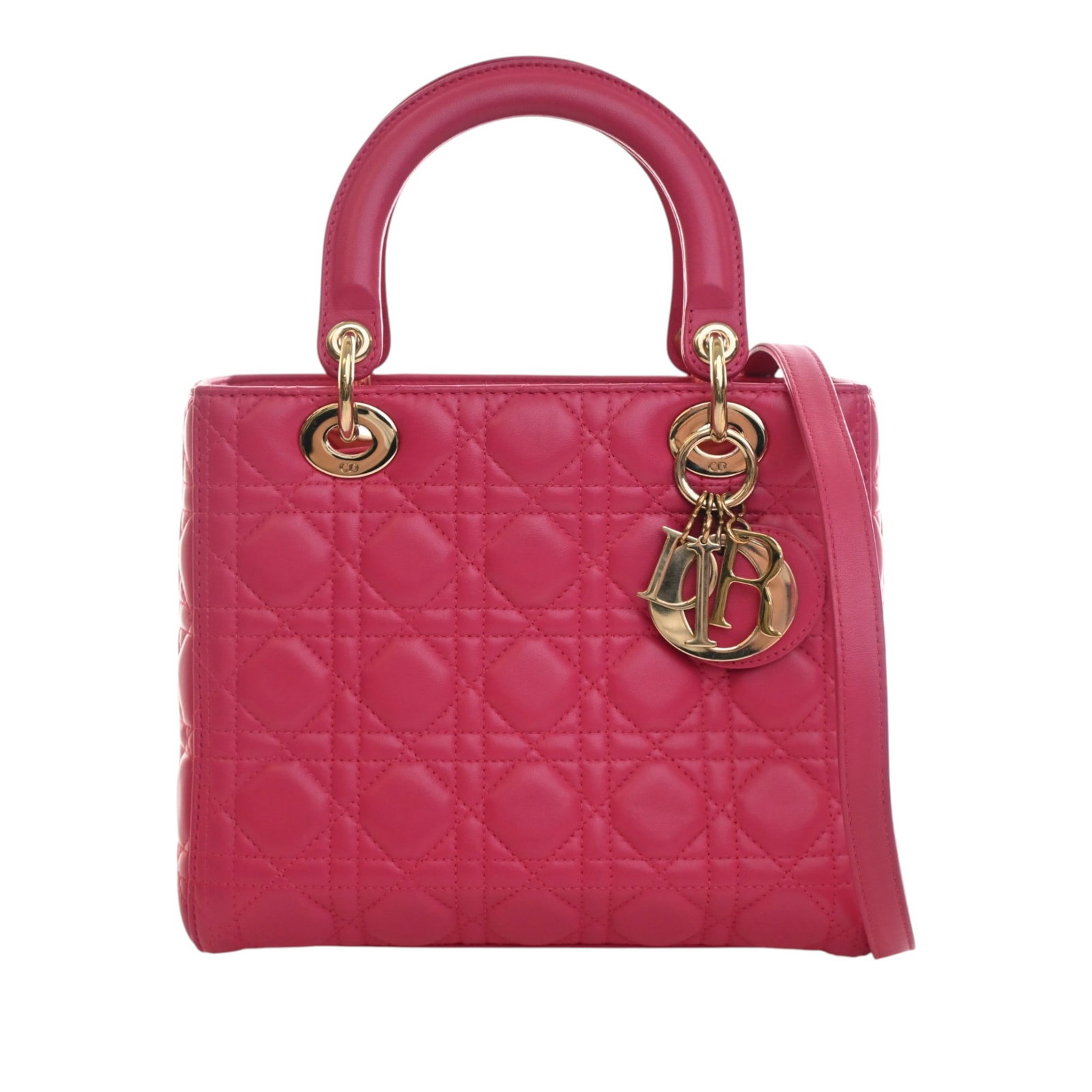 Dior Lady Dior Medium Pink Lambskin Cannage Handbag: Dior Lady Dior Medium Pink Lambskin Cannage Handbag A medium Lady Dior handbag crafted in pink quilted lambskin leather with the Cannage pattern. It features flat leather top handles, a detachable str