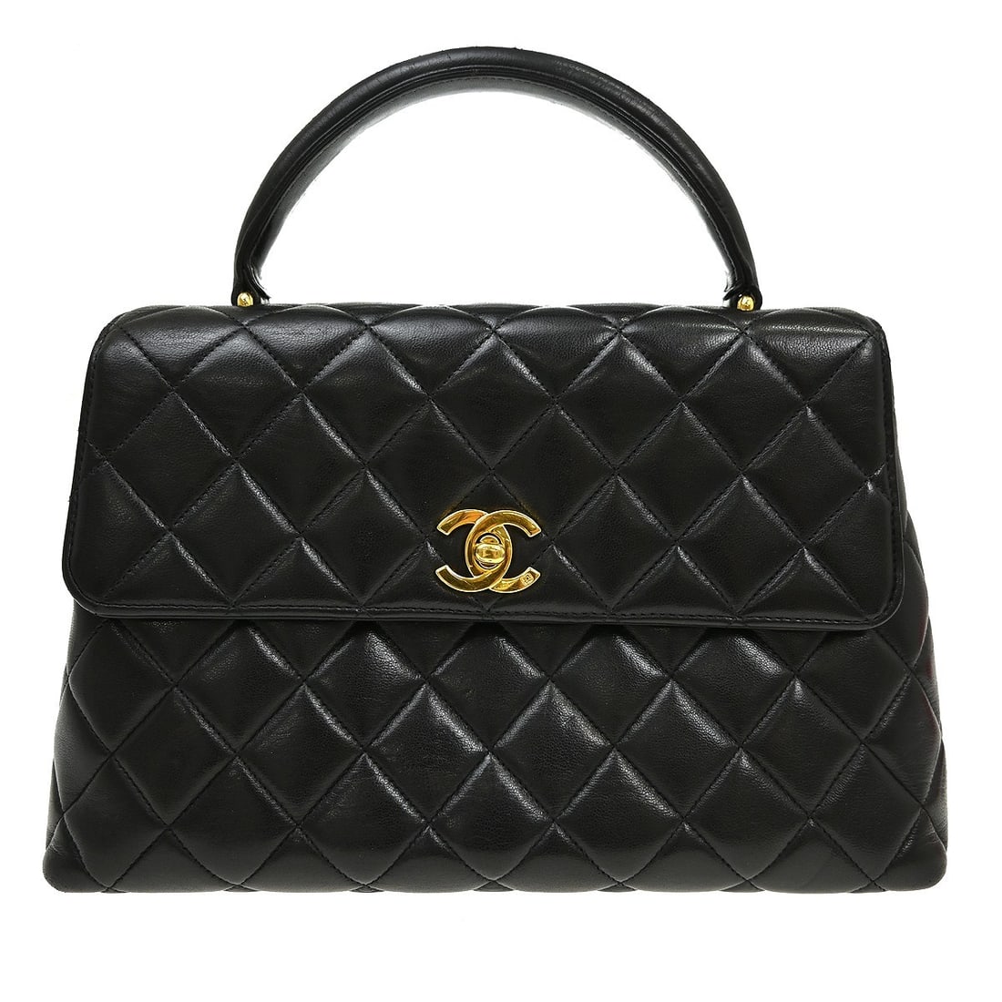 CHANEL Classic Flap medium top handle bag in black lambskin: CHANEL Classic Flap medium top handle bag in black lambskin Chanel Classic Flap top handle handbag in black lambskin with a turn lock closure and lambskin lining. This medium handbag features one exte